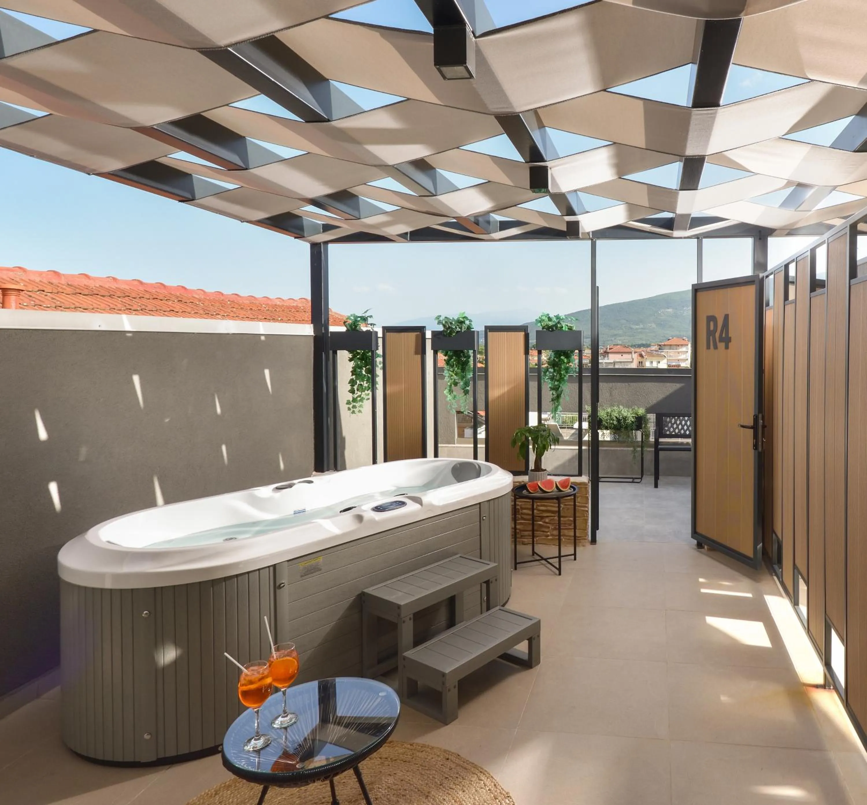 Hot Tub in CORYLUS Luxury Rooms & Suites