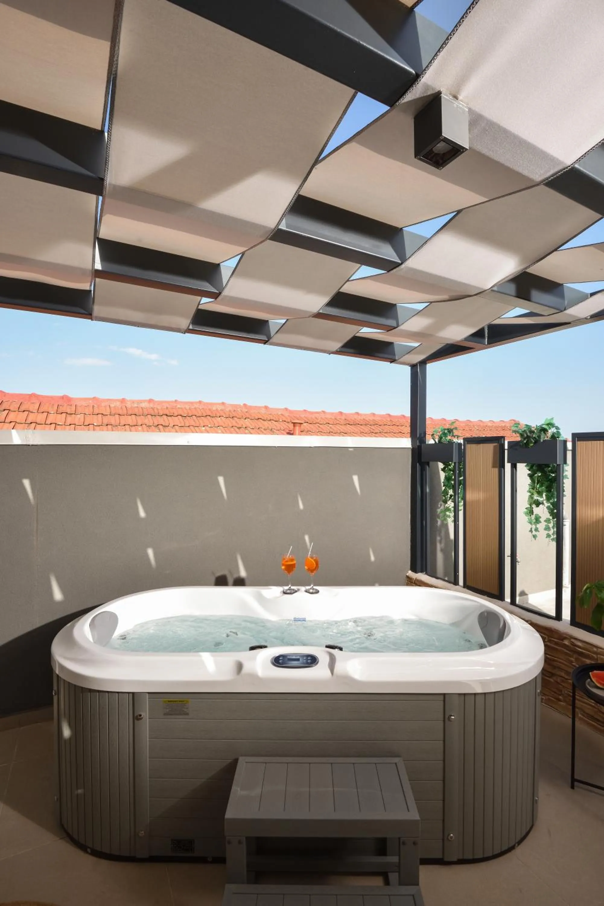 Hot Tub in CORYLUS Luxury Rooms & Suites