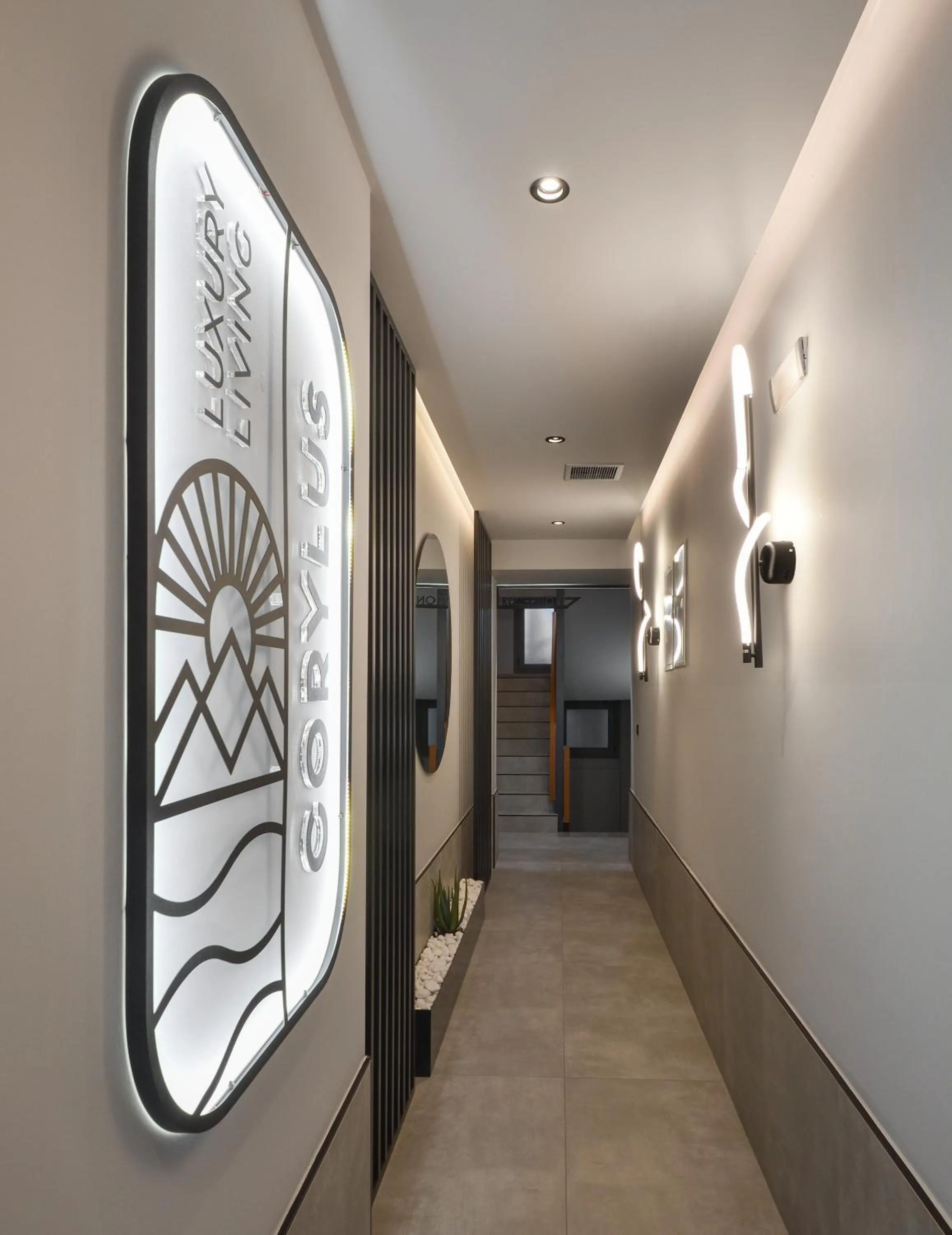 Property logo or sign in CORYLUS Luxury Rooms & Suites