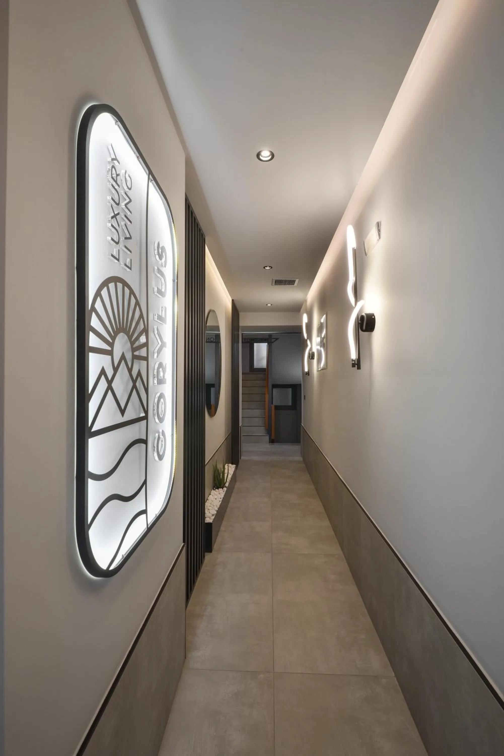 Property logo or sign in CORYLUS Luxury Rooms & Suites