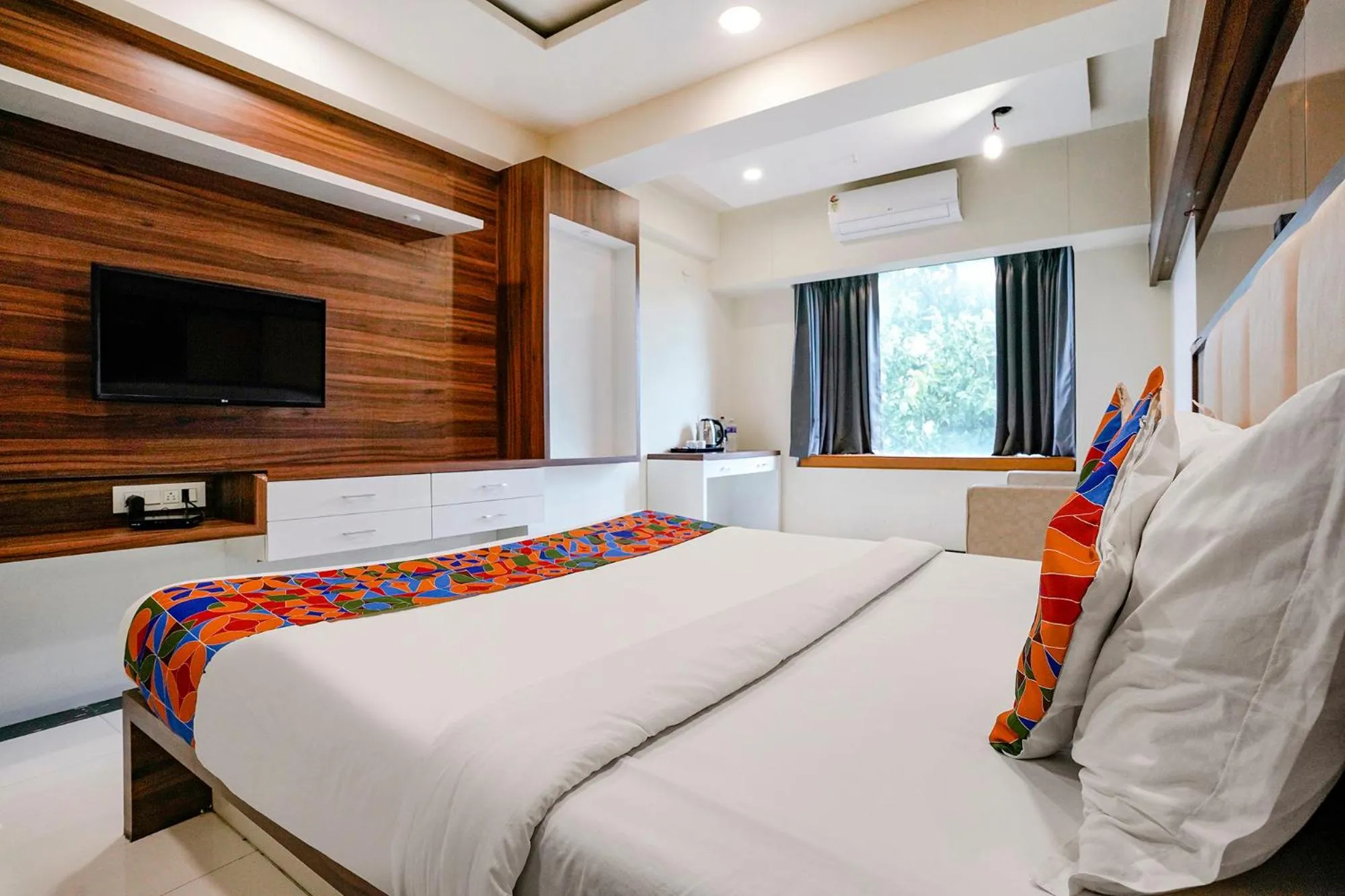 Bed in FabHotel The Nashik Inn - Nr Vijay Mamta Theatre, Nashik Road