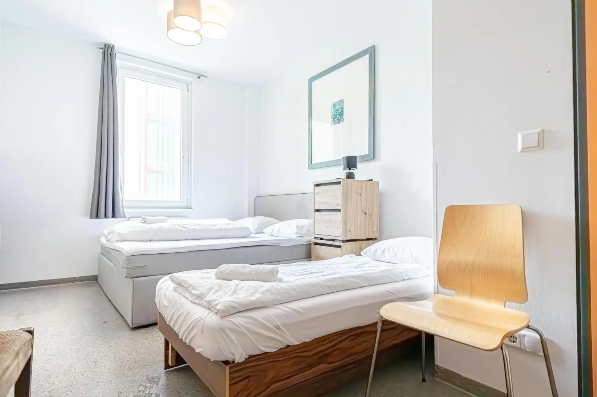 Triple Room with Private Bathroom in Hotel Astral Vienna Triple Room with Private Bathroom in Hotel Astral Vienna