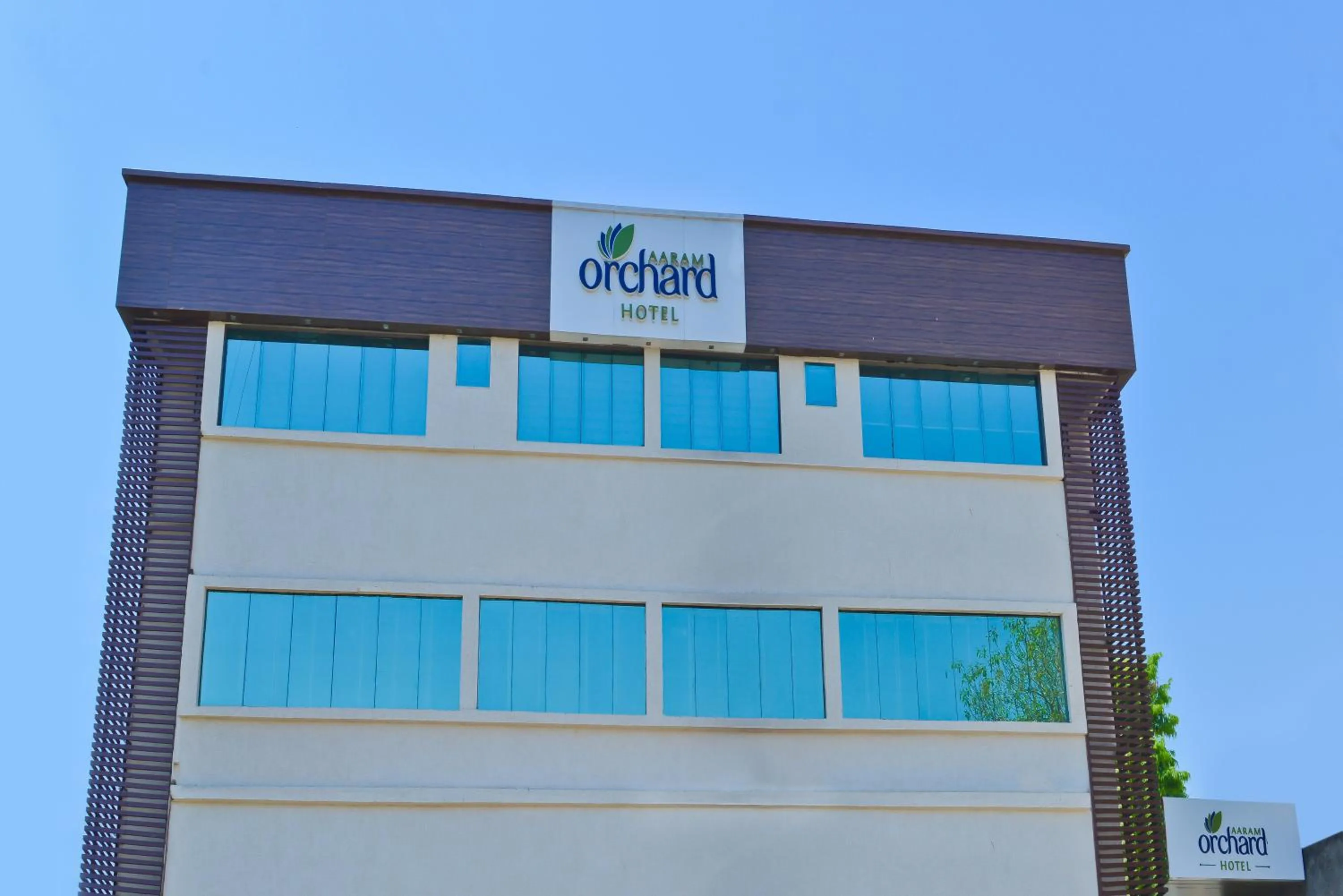Property building in Hotel Aaram Orchard