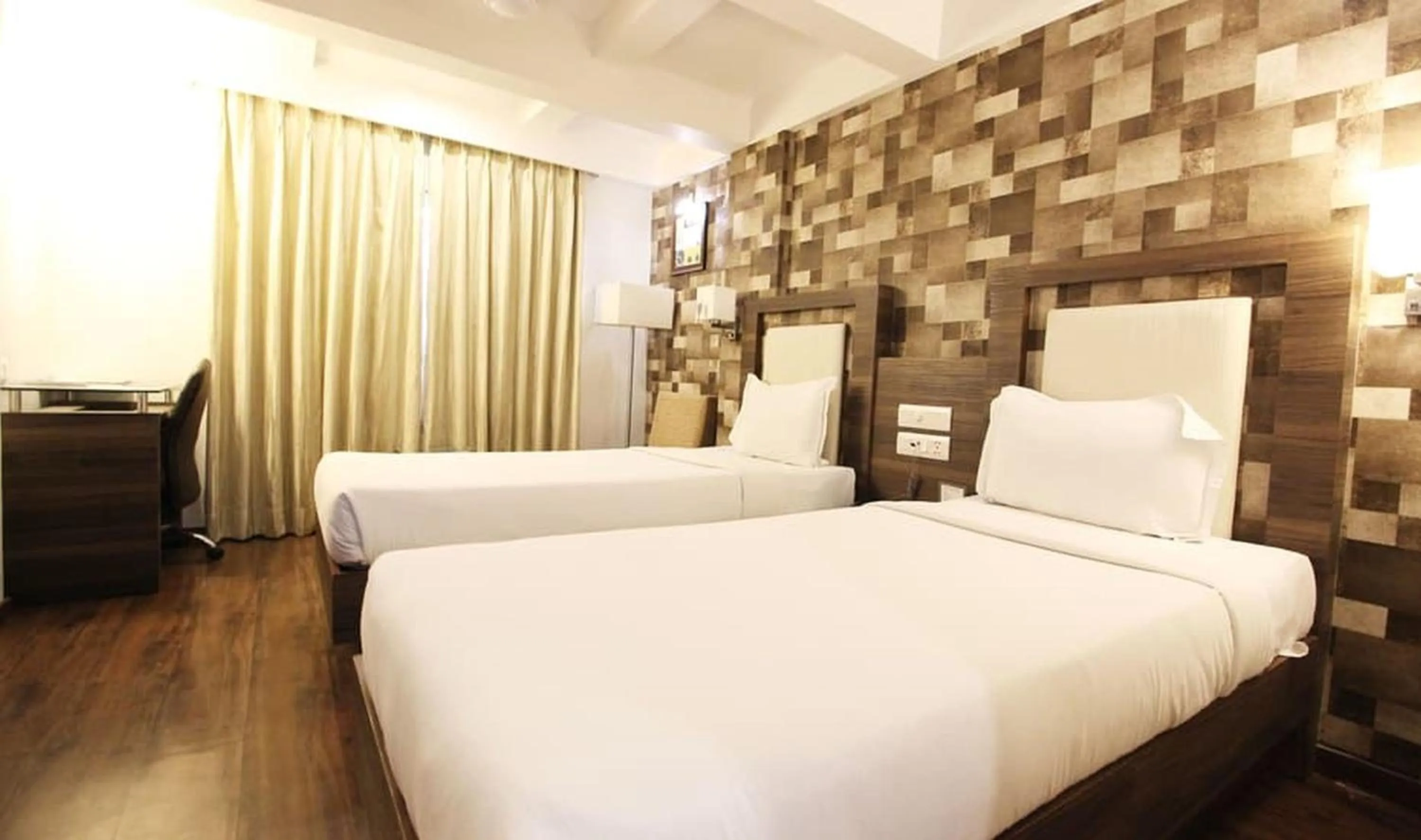 Bed in Hotel Aaram Orchard