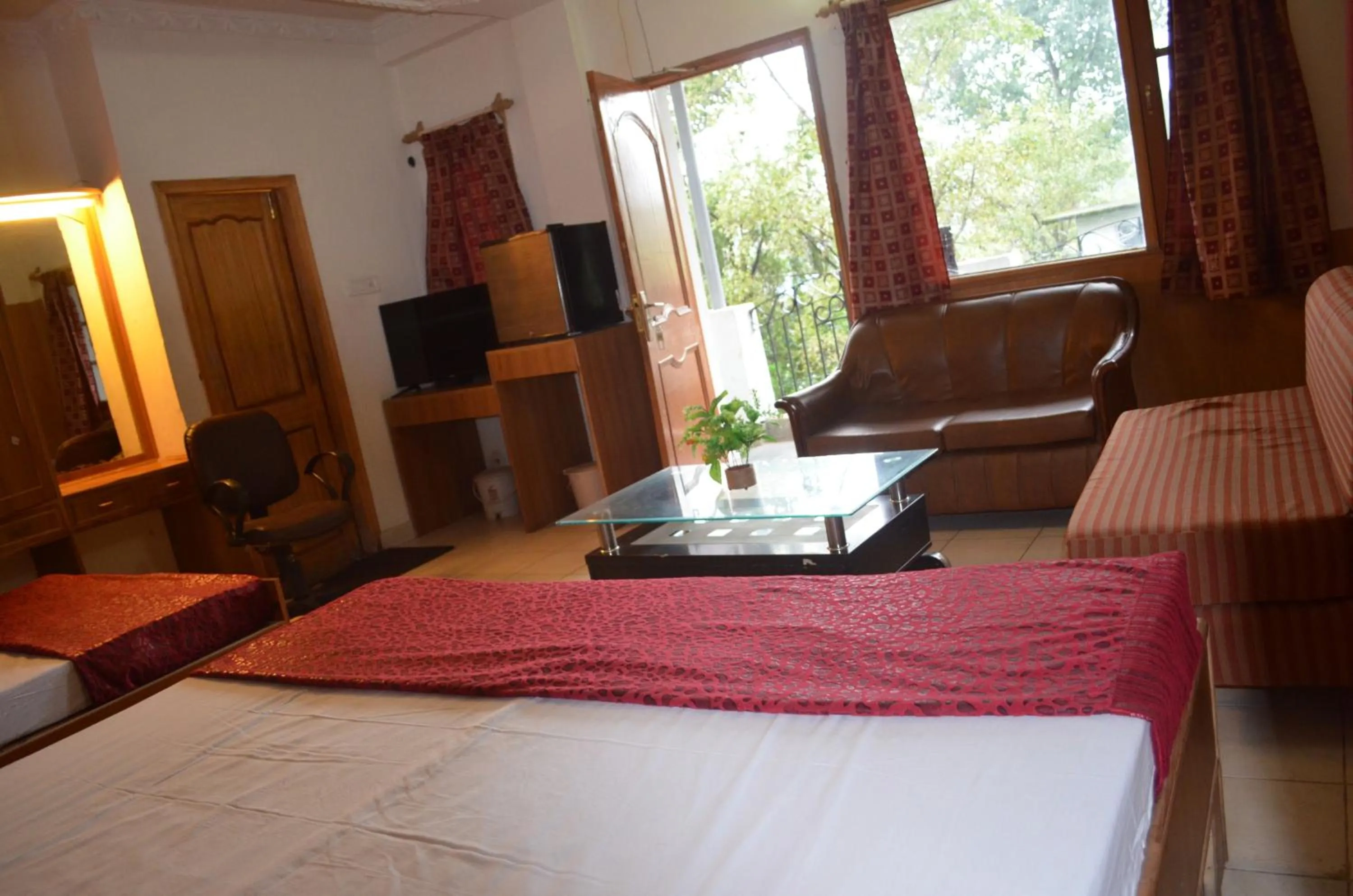 Photo of the whole room, Bed in Hotel Centre Point Resorts Palampur