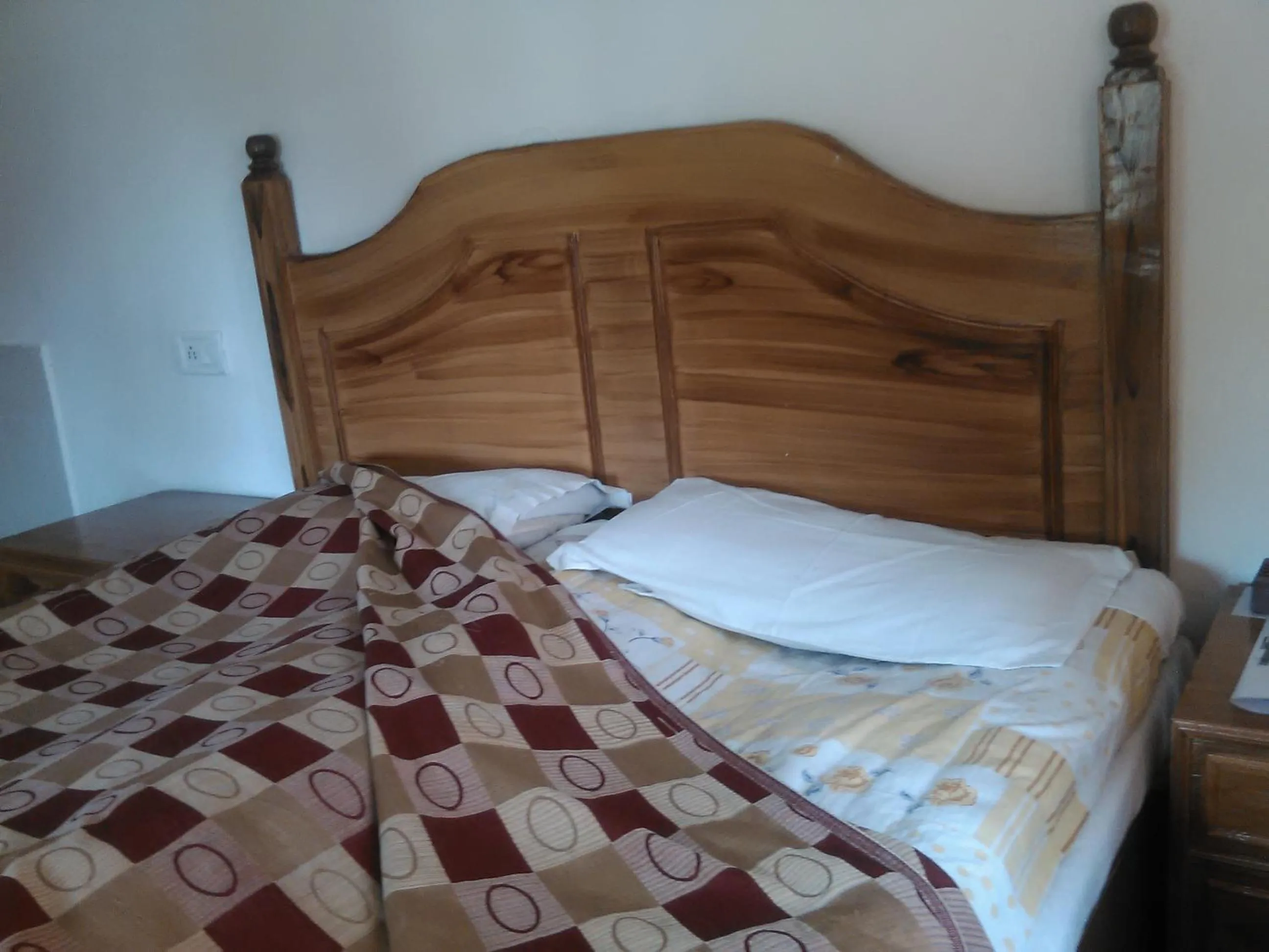 Bed in Hotel Centre Point Resorts Palampur