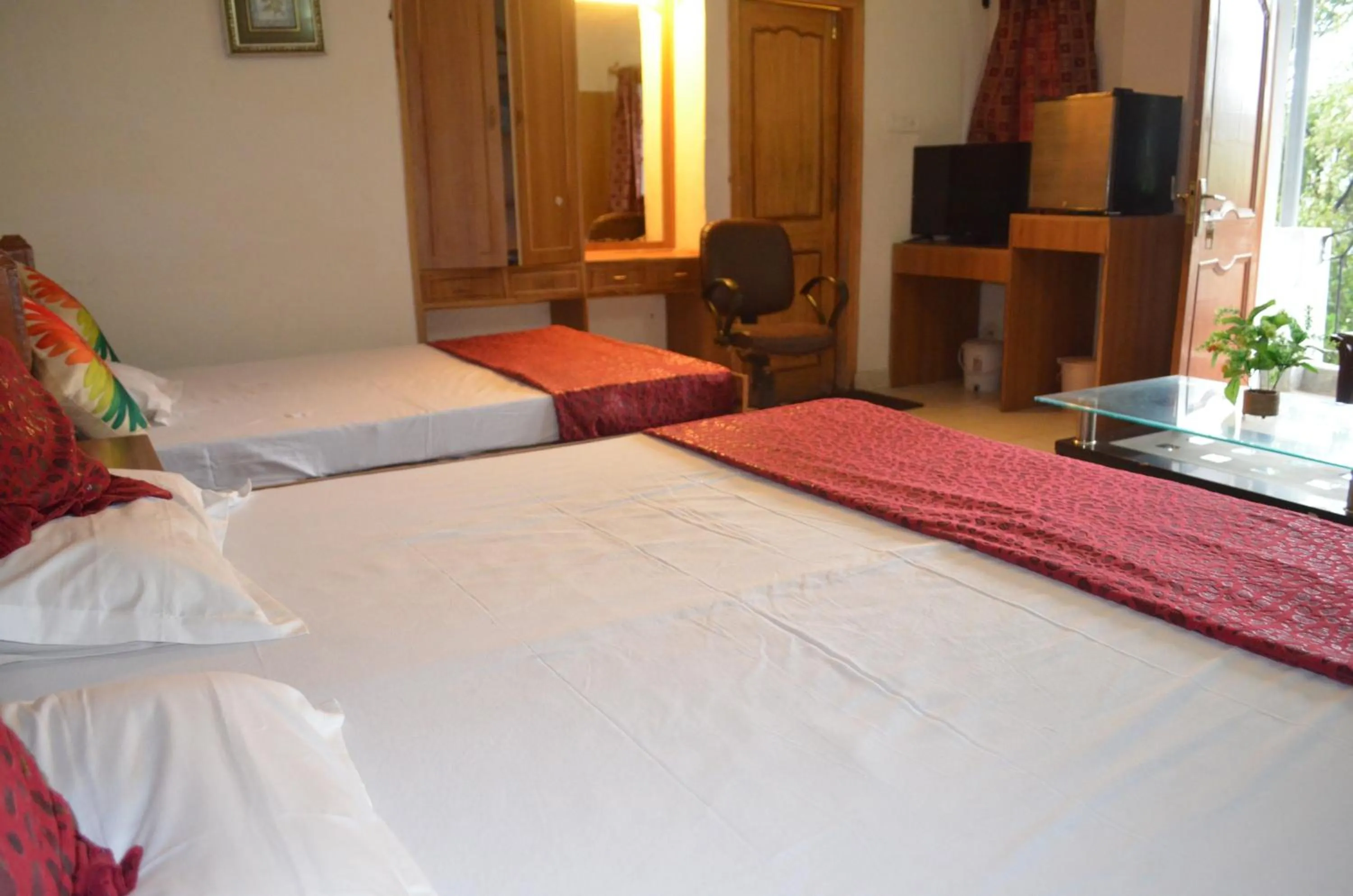 Bed in Hotel Centre Point Resorts Palampur