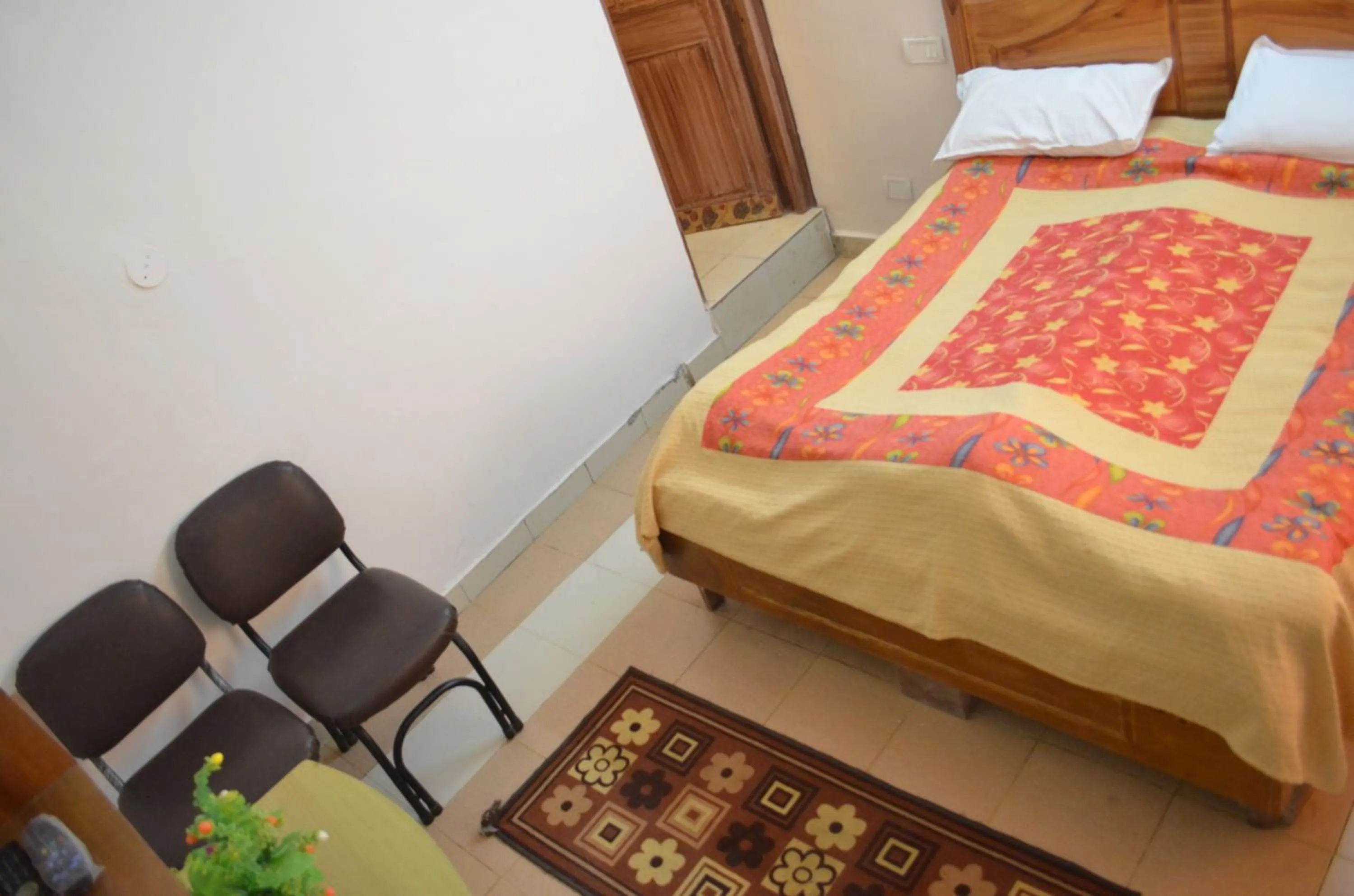 Bed in Hotel Centre Point Resorts Palampur