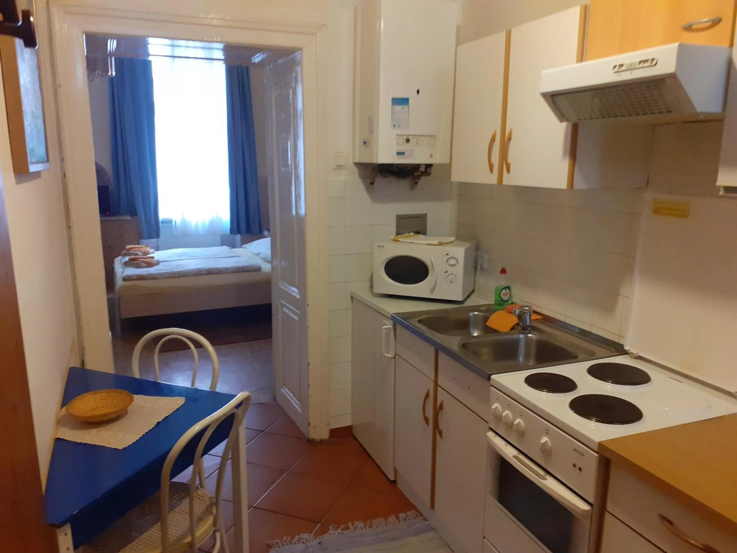 Kitchen or kitchenette in HappyHostel