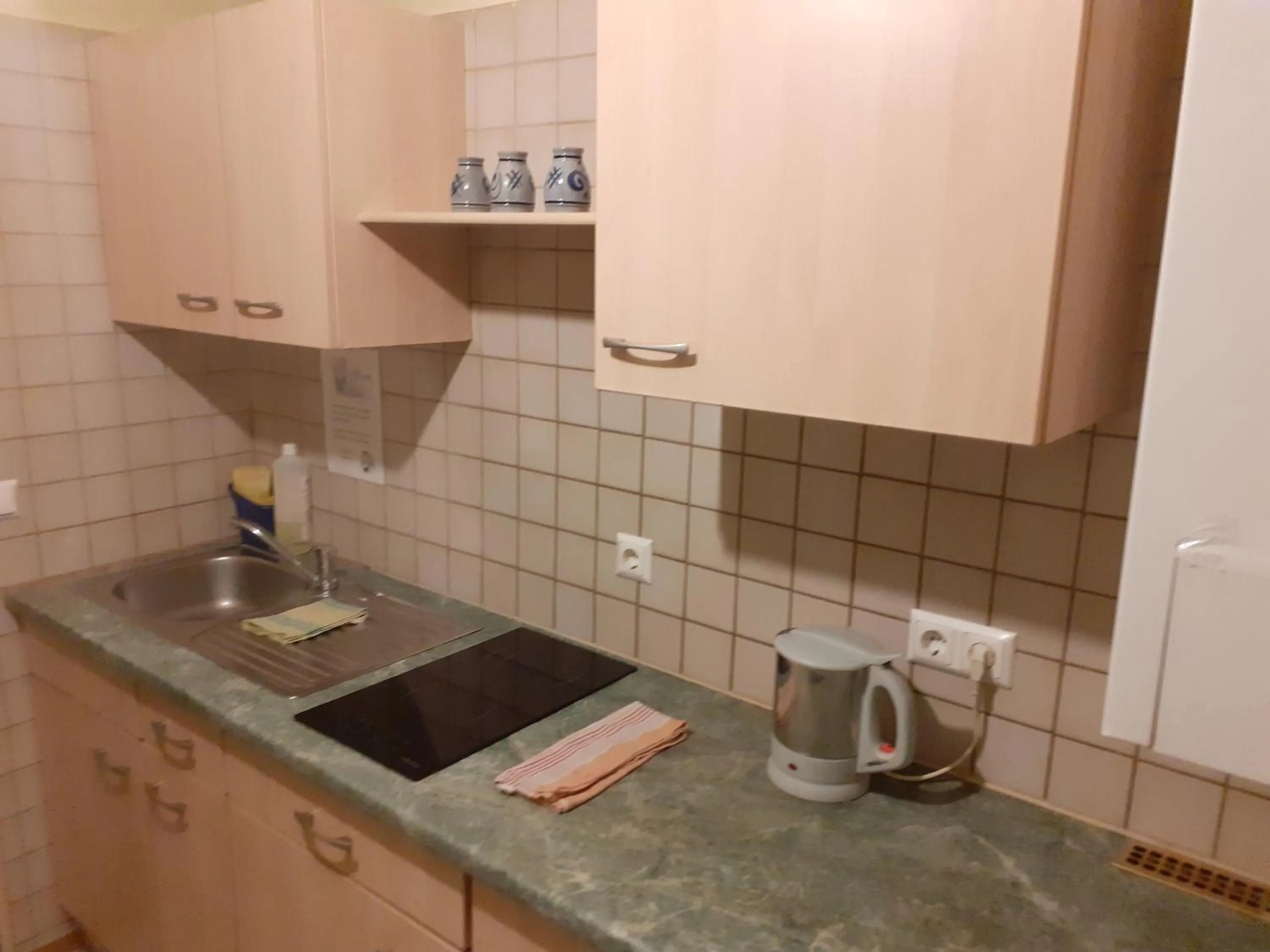 Communal kitchen in HappyHostel