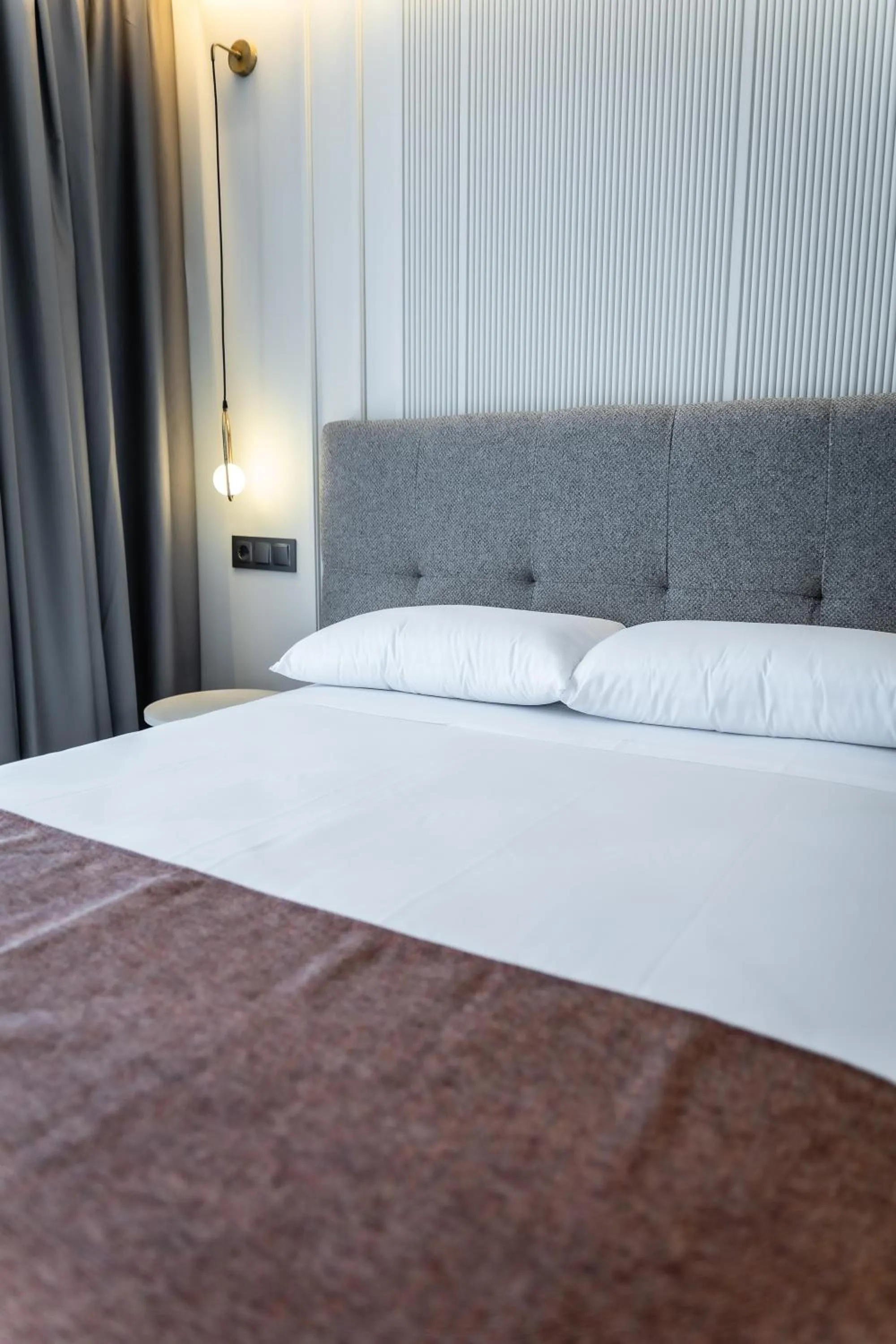 Bed in HOTEL CORONA DE PADRÓN