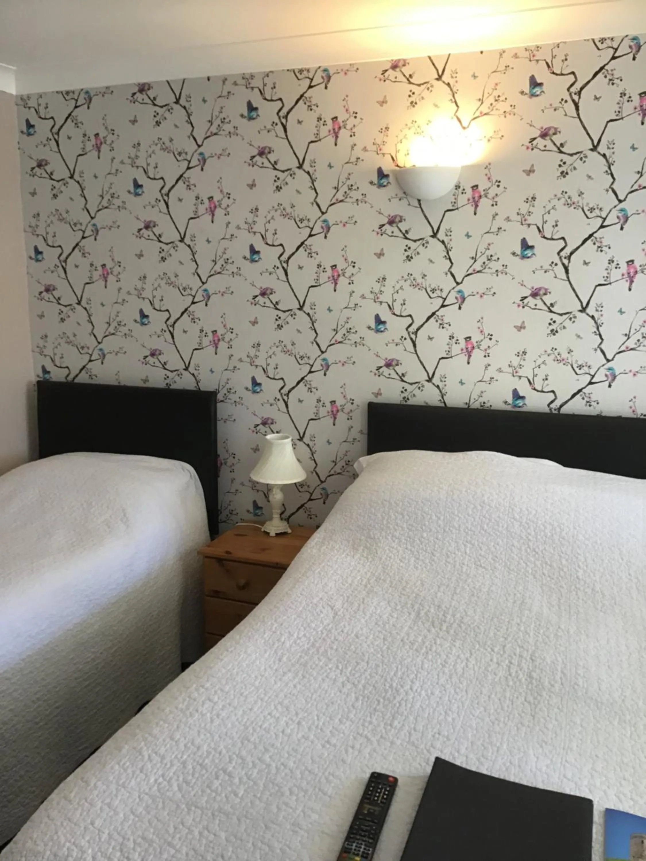 Bed in The New Inn Motel