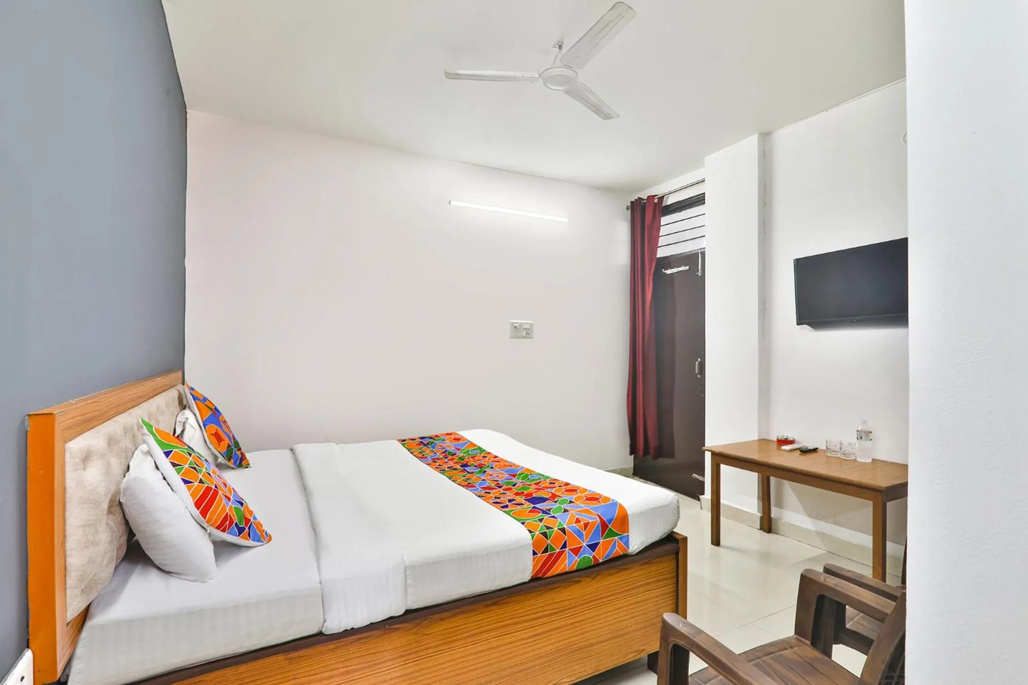 Bedroom, Bed in FabHotel Raas Inn