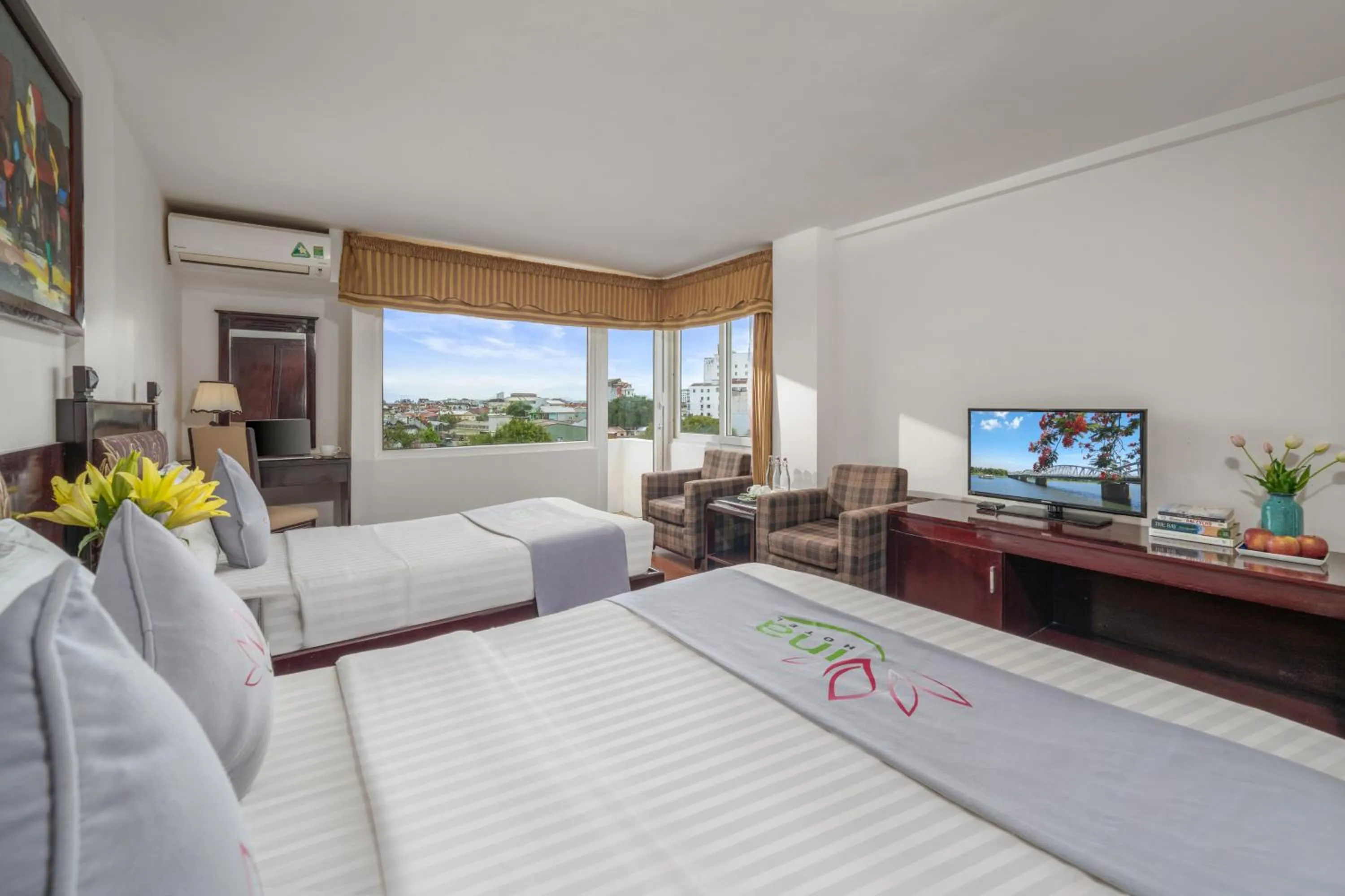 Communal lounge/ TV room, Bed in Vina Hotel Hue