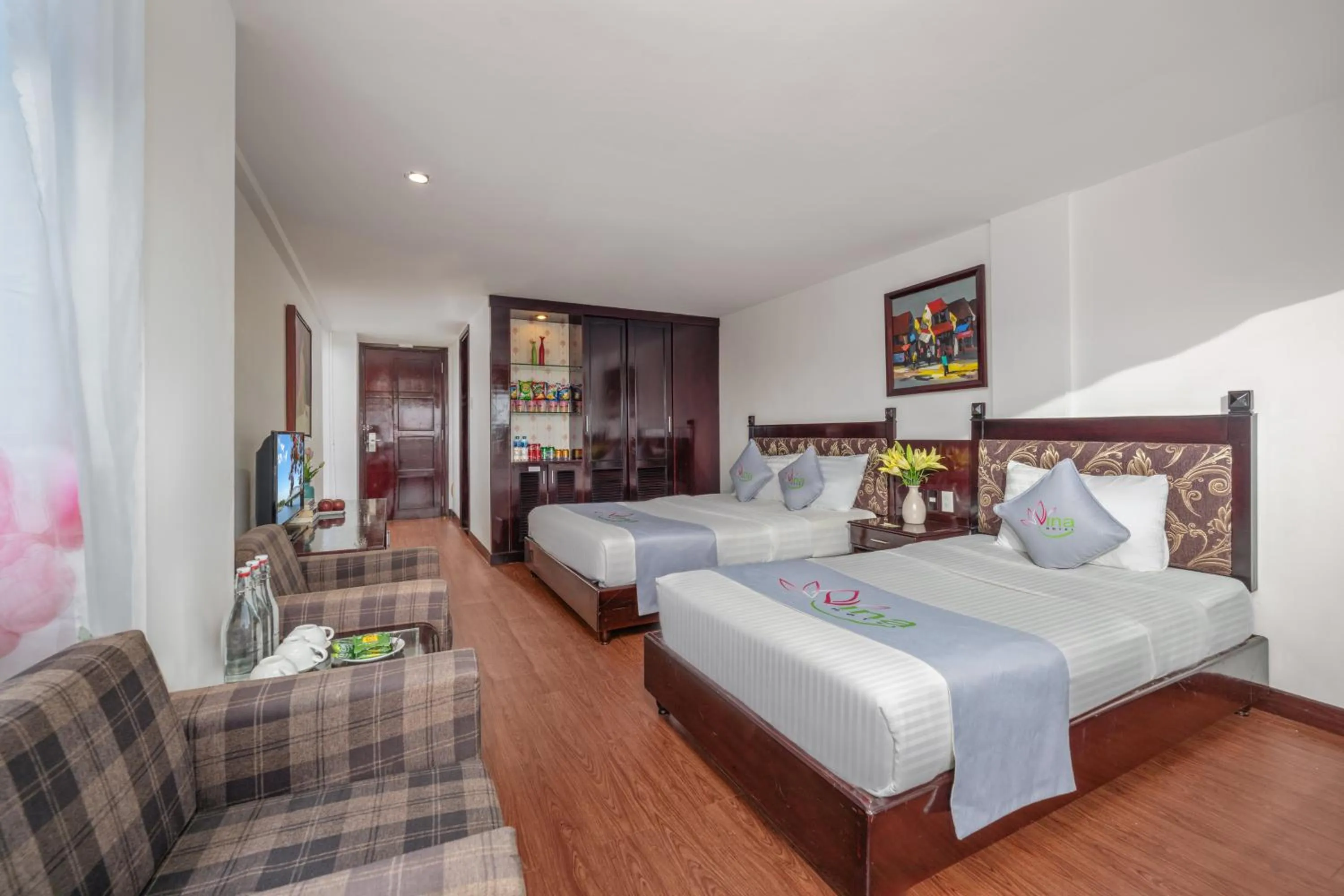 Communal lounge/ TV room, Bed in Vina Hotel Hue