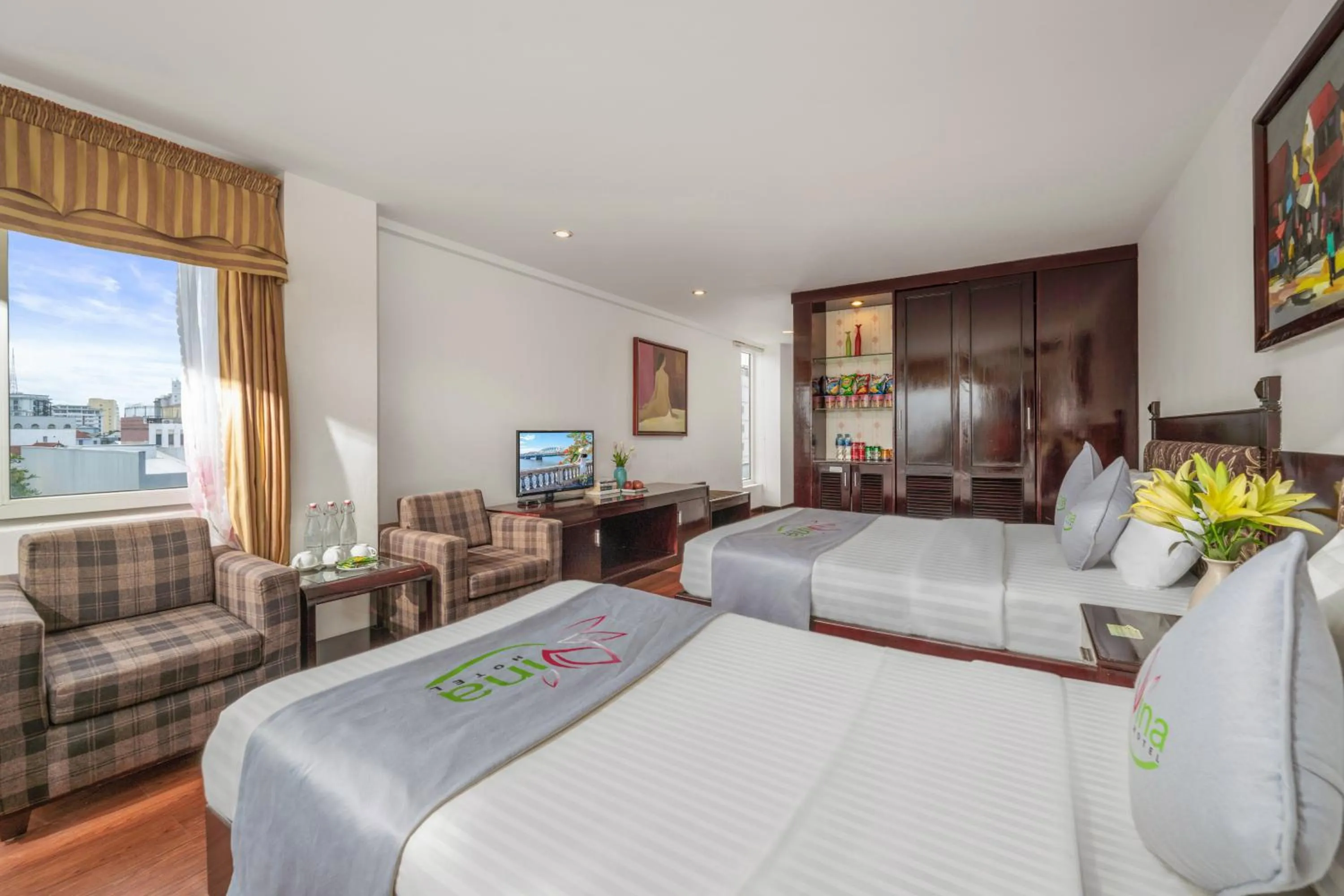 Communal lounge/ TV room, Bed in Vina Hotel Hue