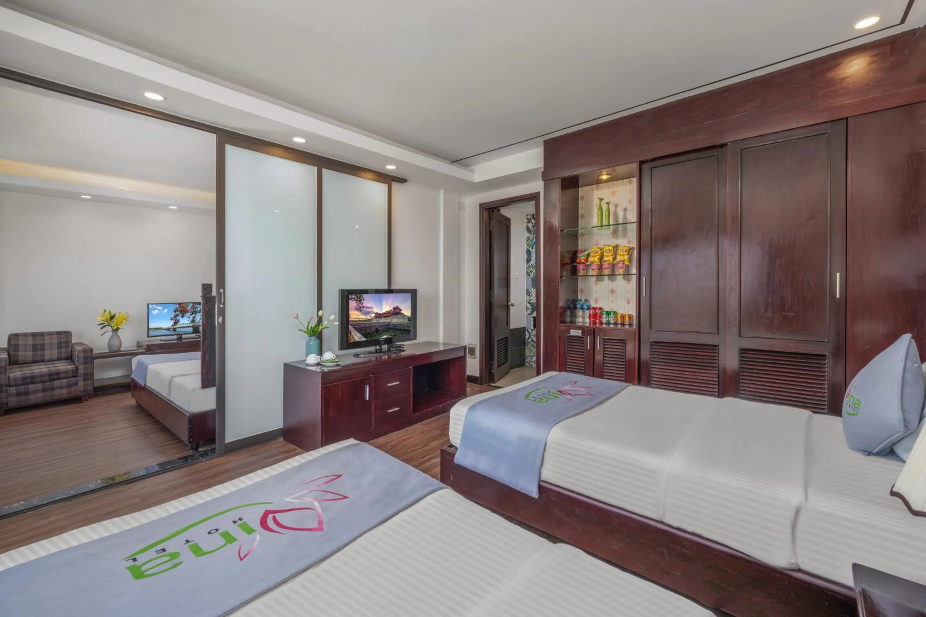 Communal lounge/ TV room, Bed in Vina Hotel Hue