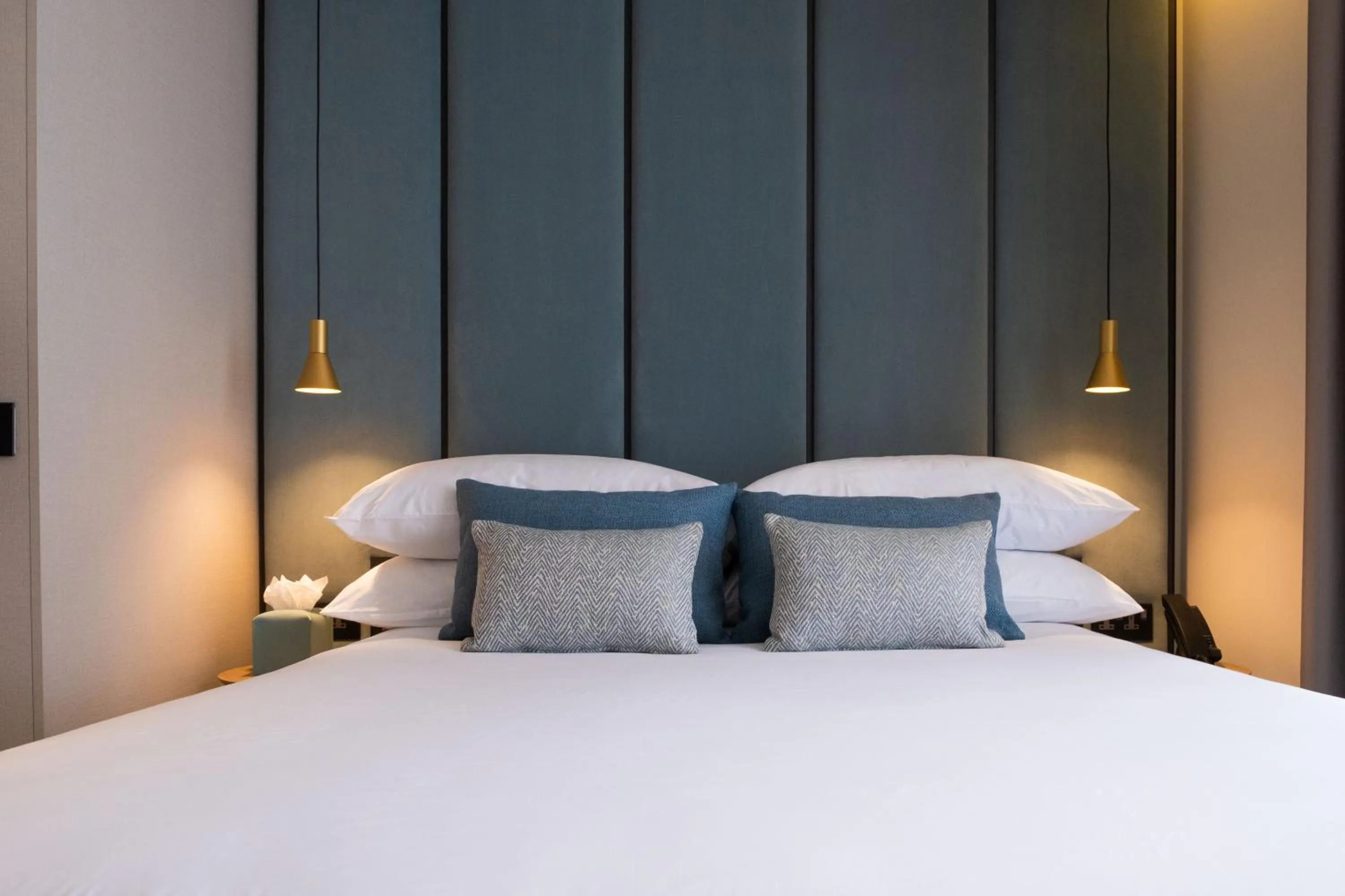 Bed in Deep Blu Boutique Hotel