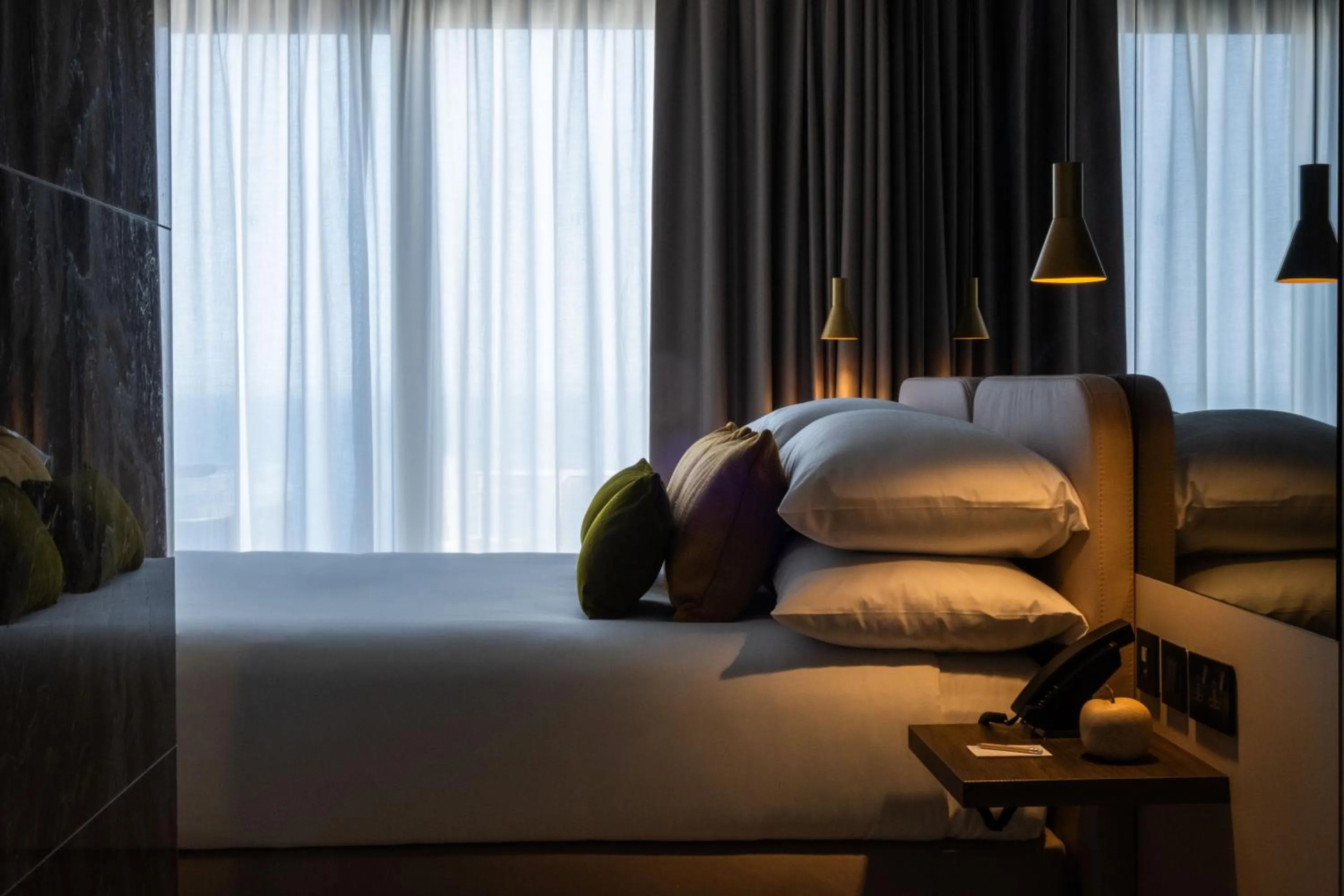 Bed in Deep Blu Boutique Hotel