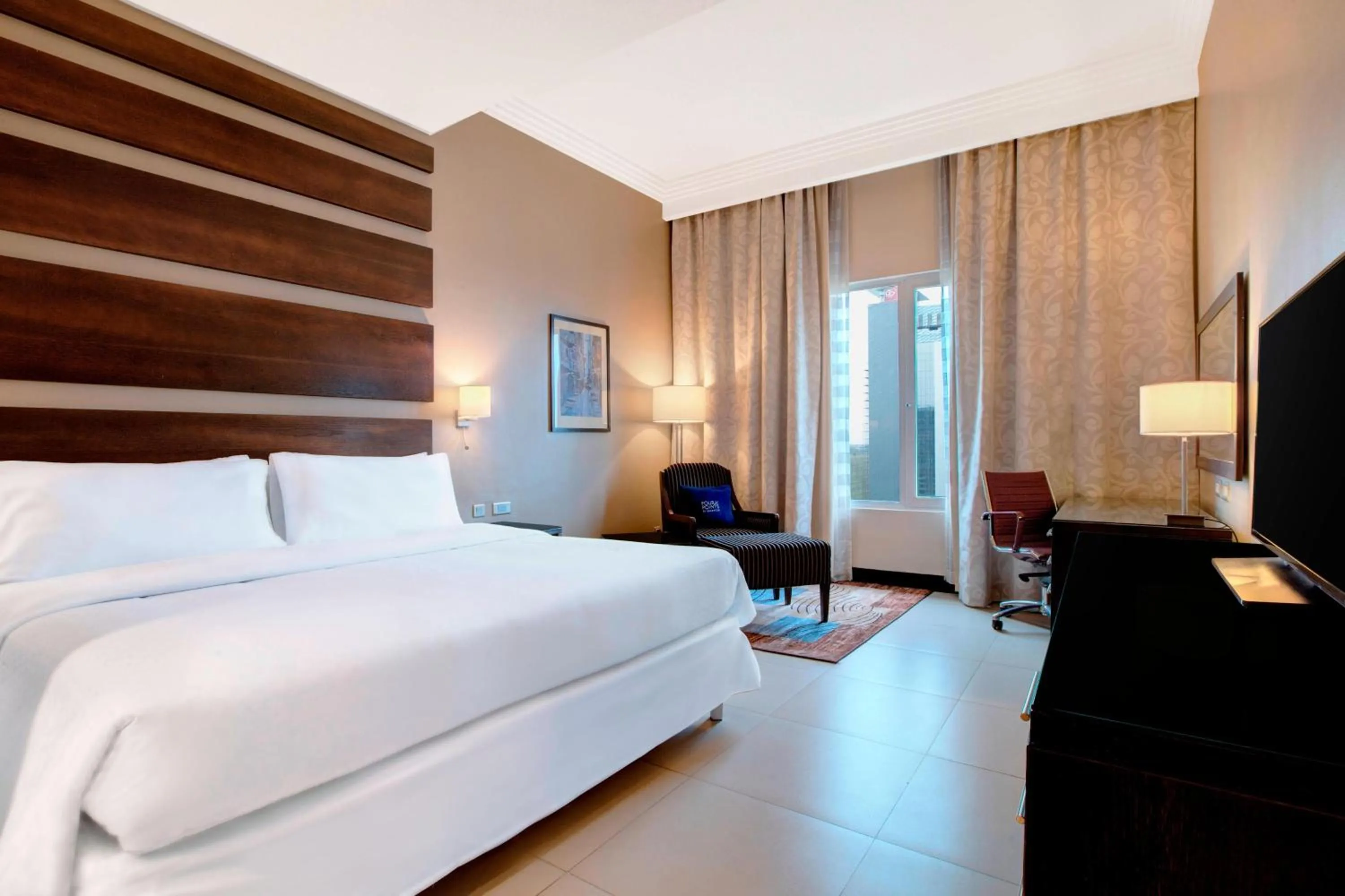 Photo of the whole room, Bed in Four Points by Sheraton Lagos