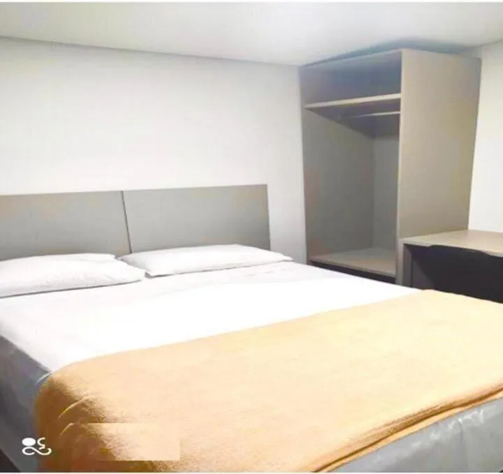 Bed in Front Hotel Expominas