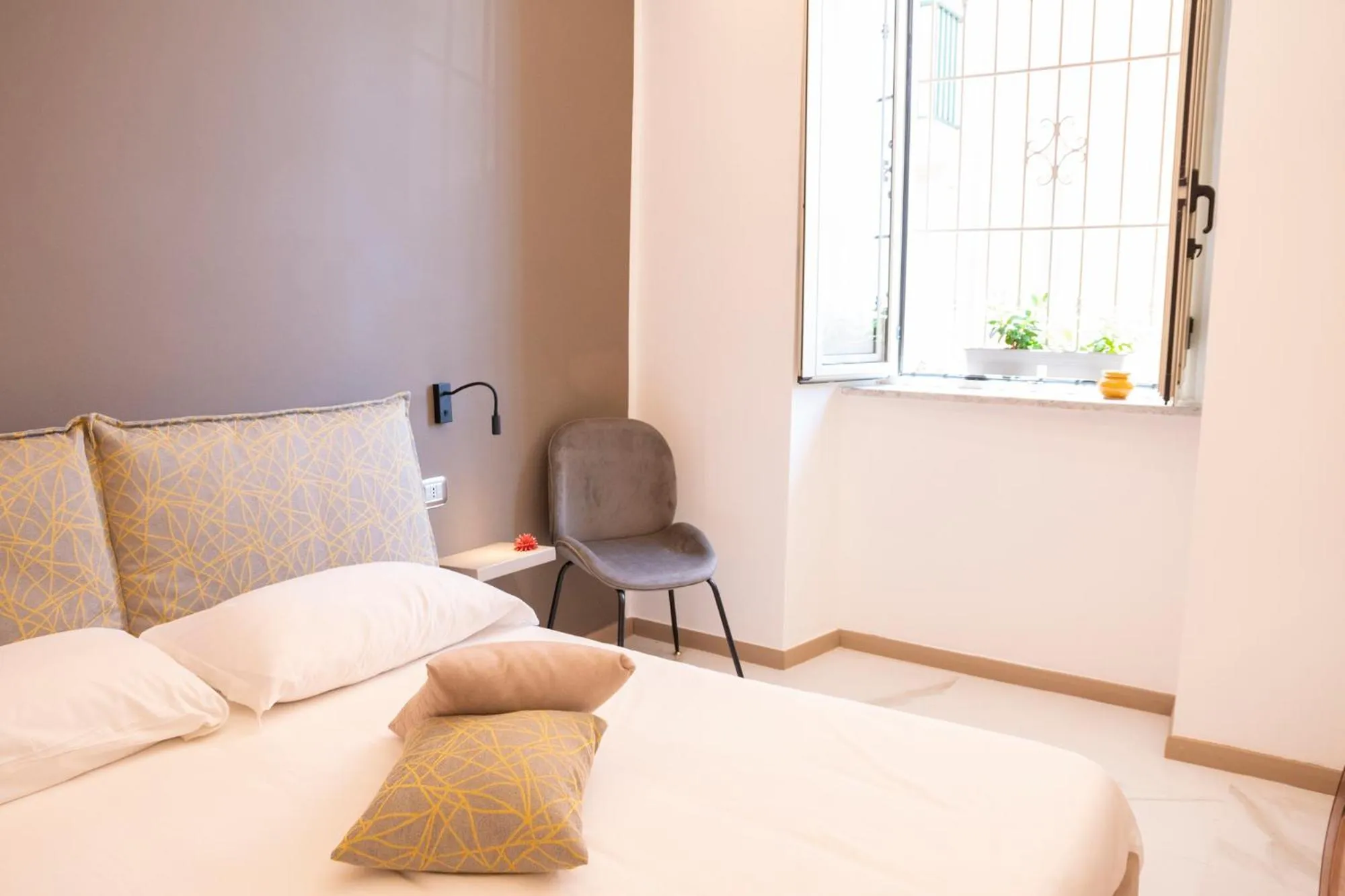 Bed in BelMa' Aparthotel and Rooms