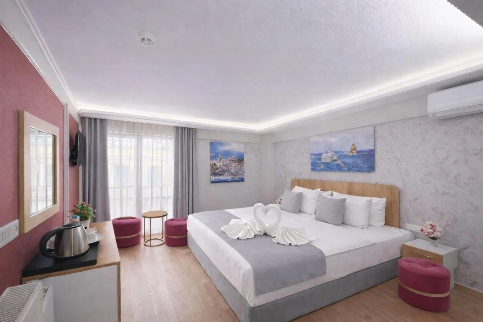 Bed in Ria Suites Boutique Hotel