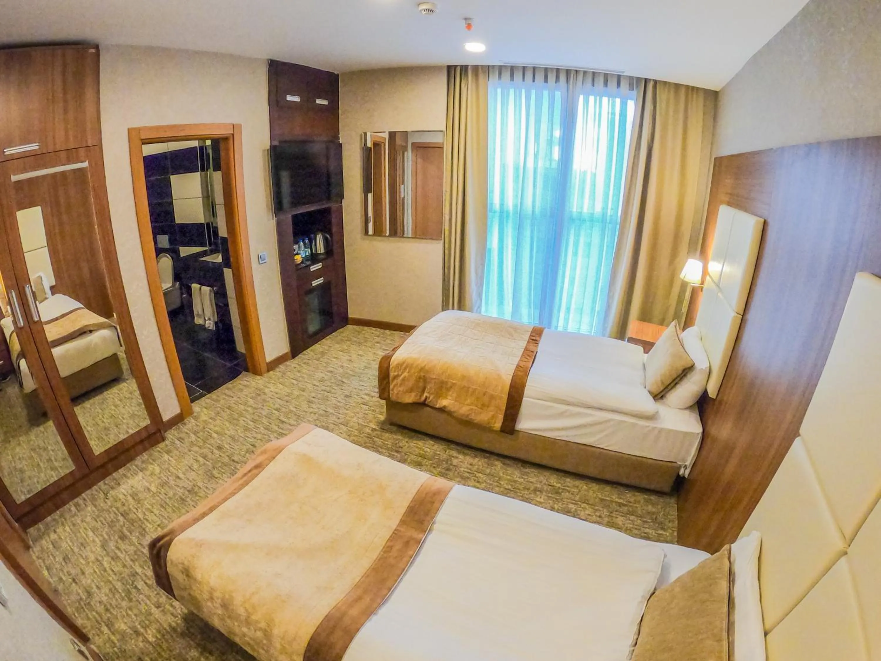 Bedroom in Akman Premium Hotel