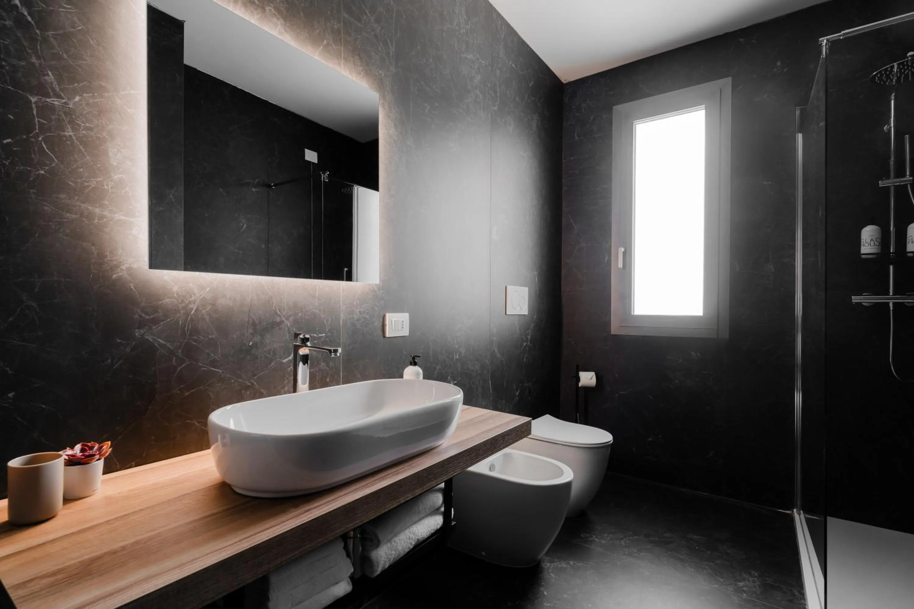 Bathroom in Glass House - Smart Rooms & Parking