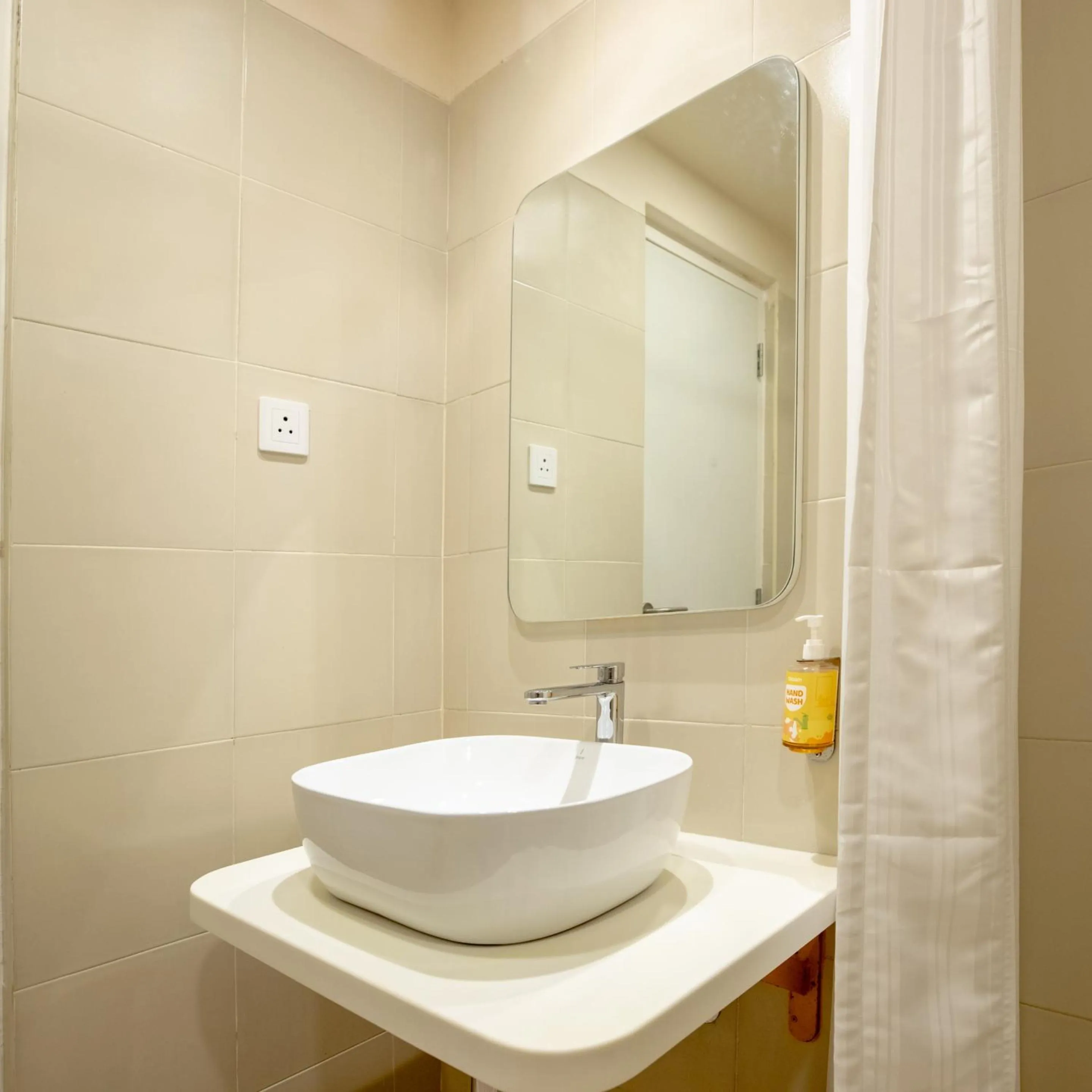 Bathroom in Bloom Hotel - HSR Layout Sector 6