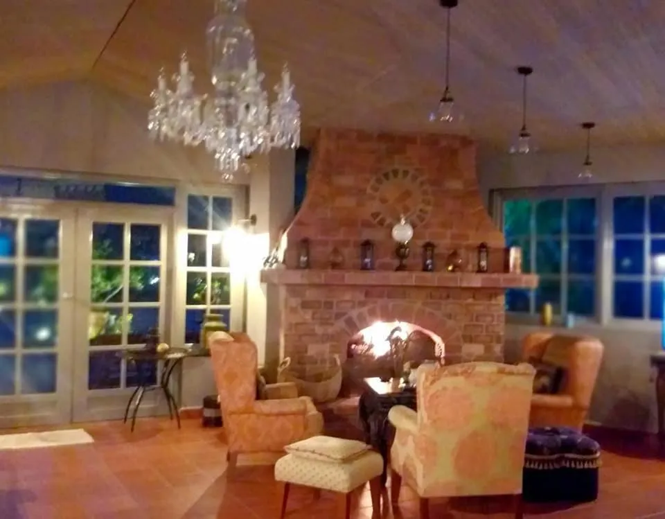 Communal lounge/ TV room in SCHUMANN'S RESORT & PARK