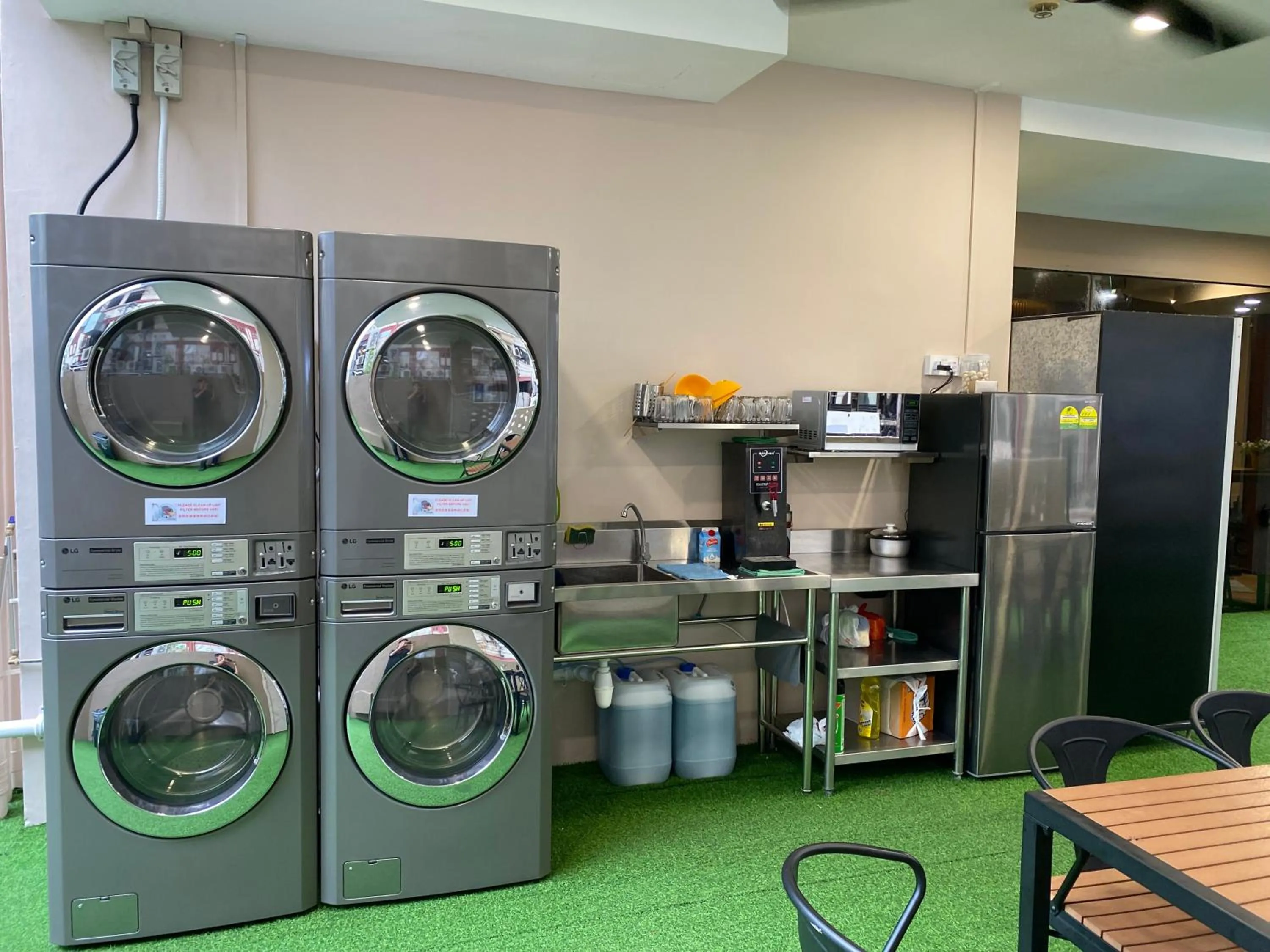 Communal lounge/ TV room in D'Nova Hotel Kallang