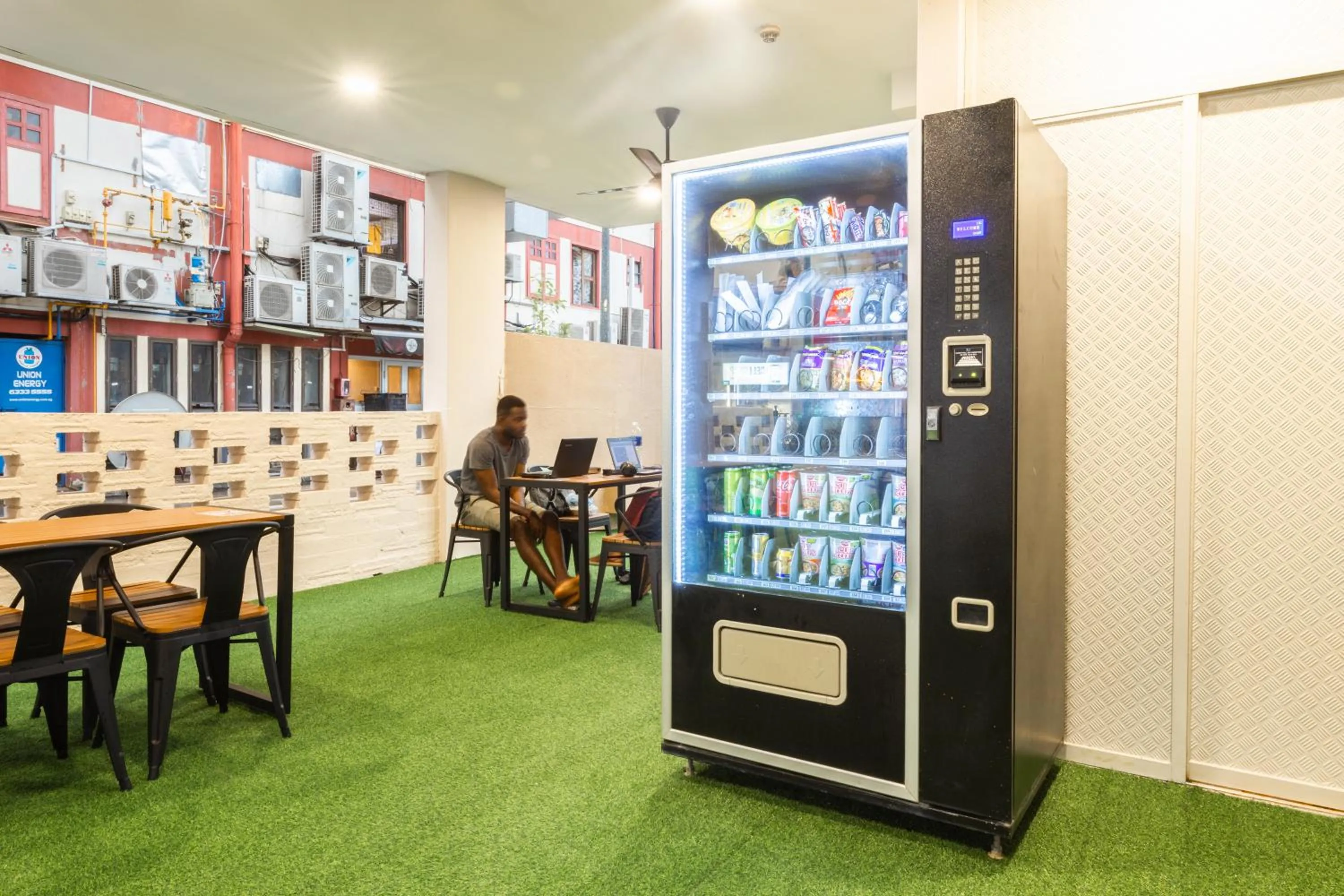 Communal lounge/ TV room in D'Nova Hotel Kallang