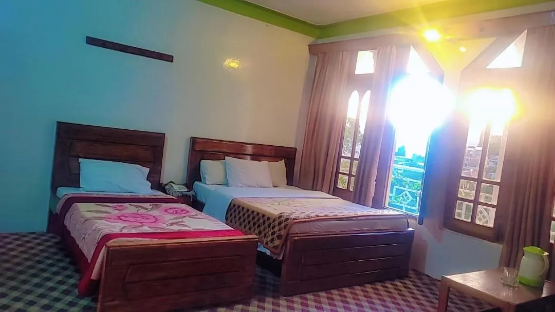 Bed in Hotel Miandam Palace