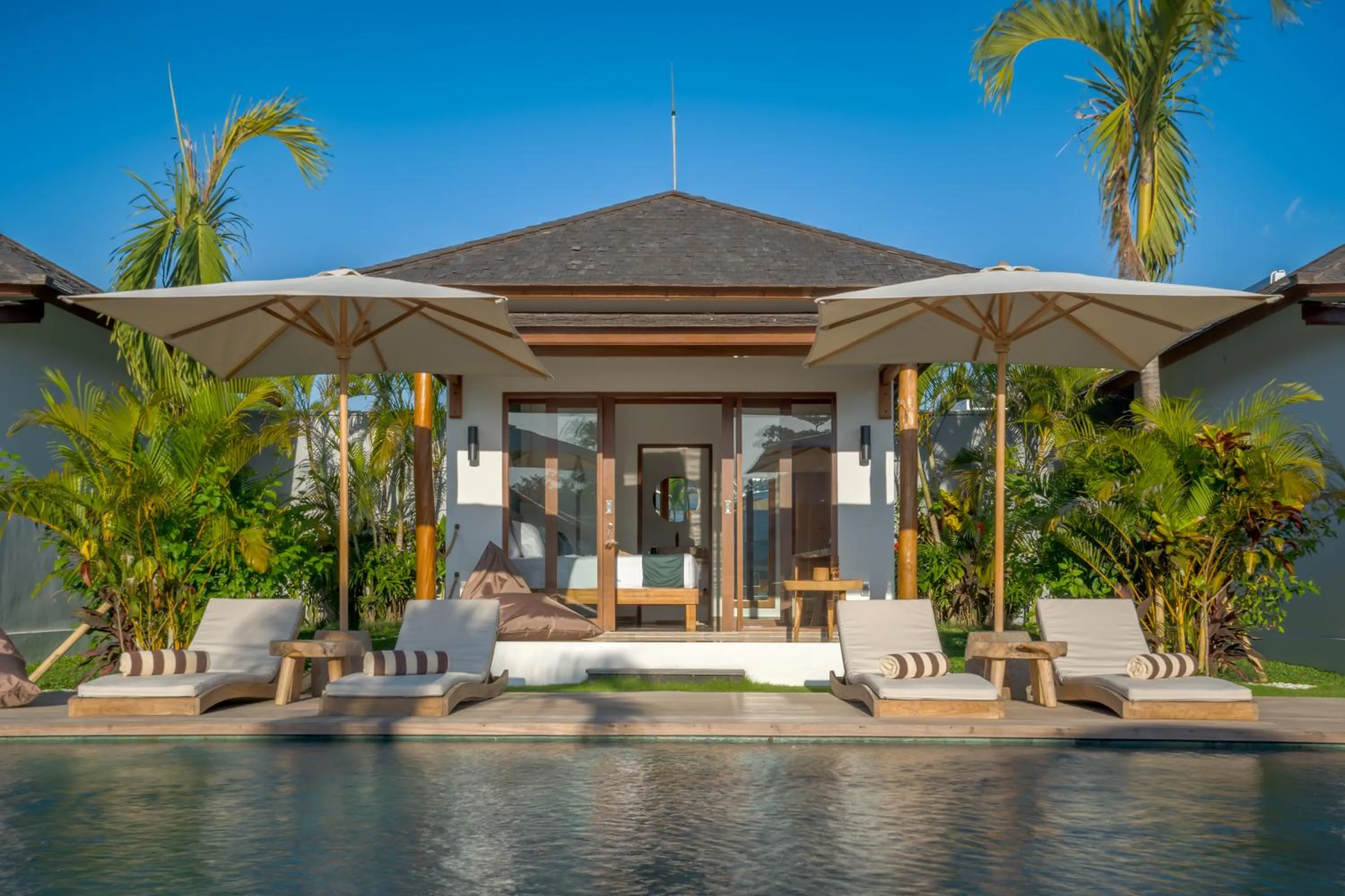 sunbed in EHOA NYANYI BEACH Boutique Hotel - In front of entrance to NUANU