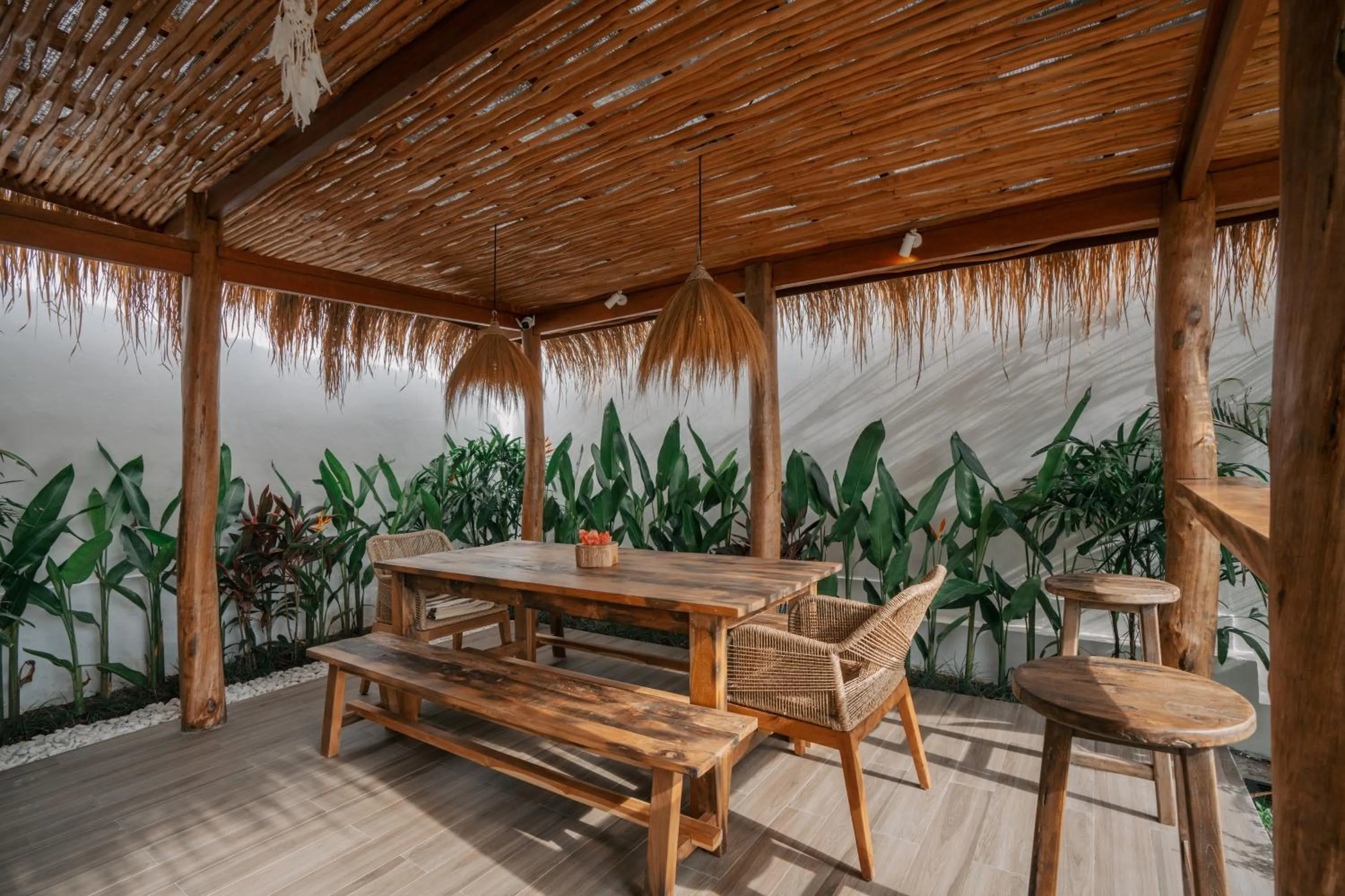 Dining area in EHOA NYANYI BEACH Boutique Hotel - In front of entrance to NUANU