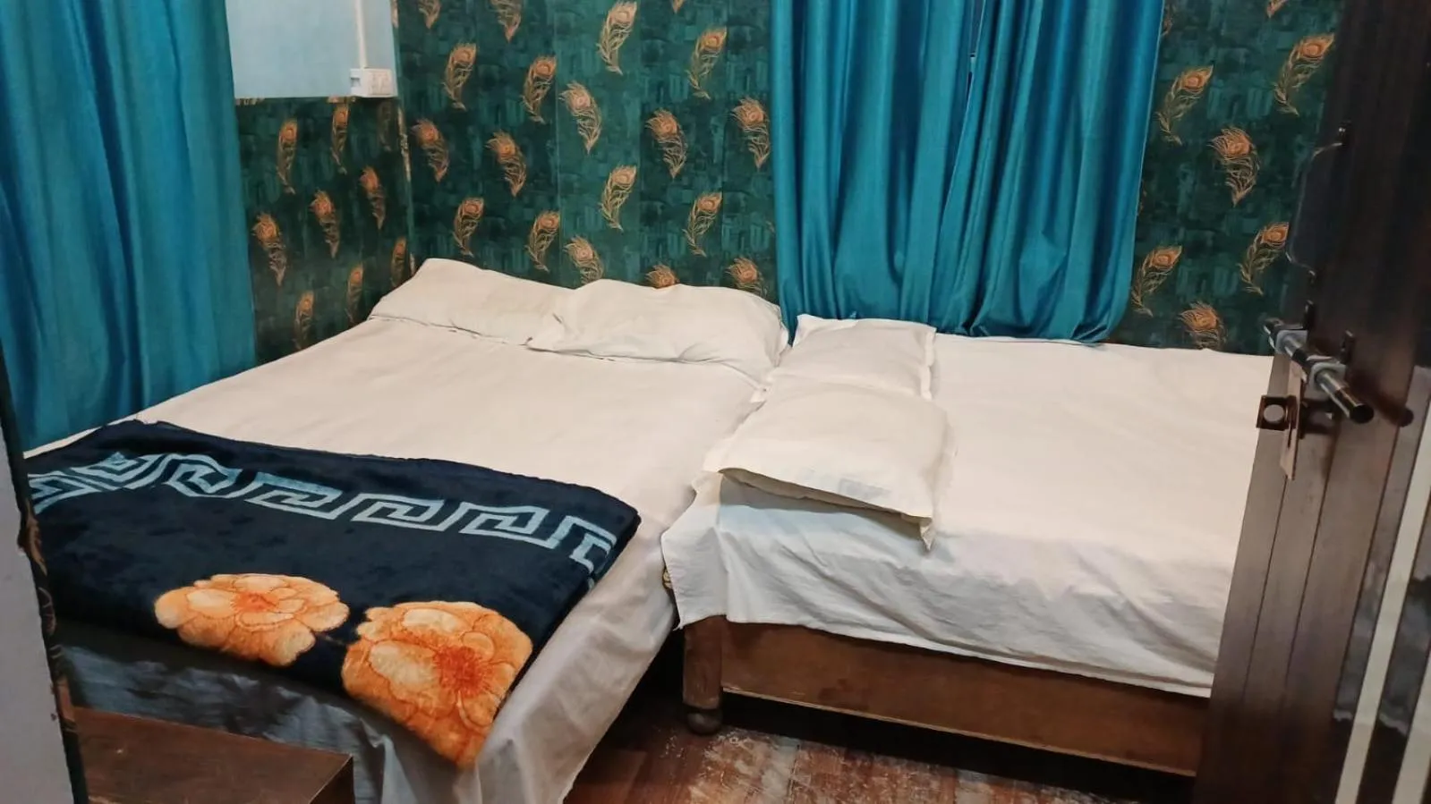 Bed in Maa Tara AC Home Stay