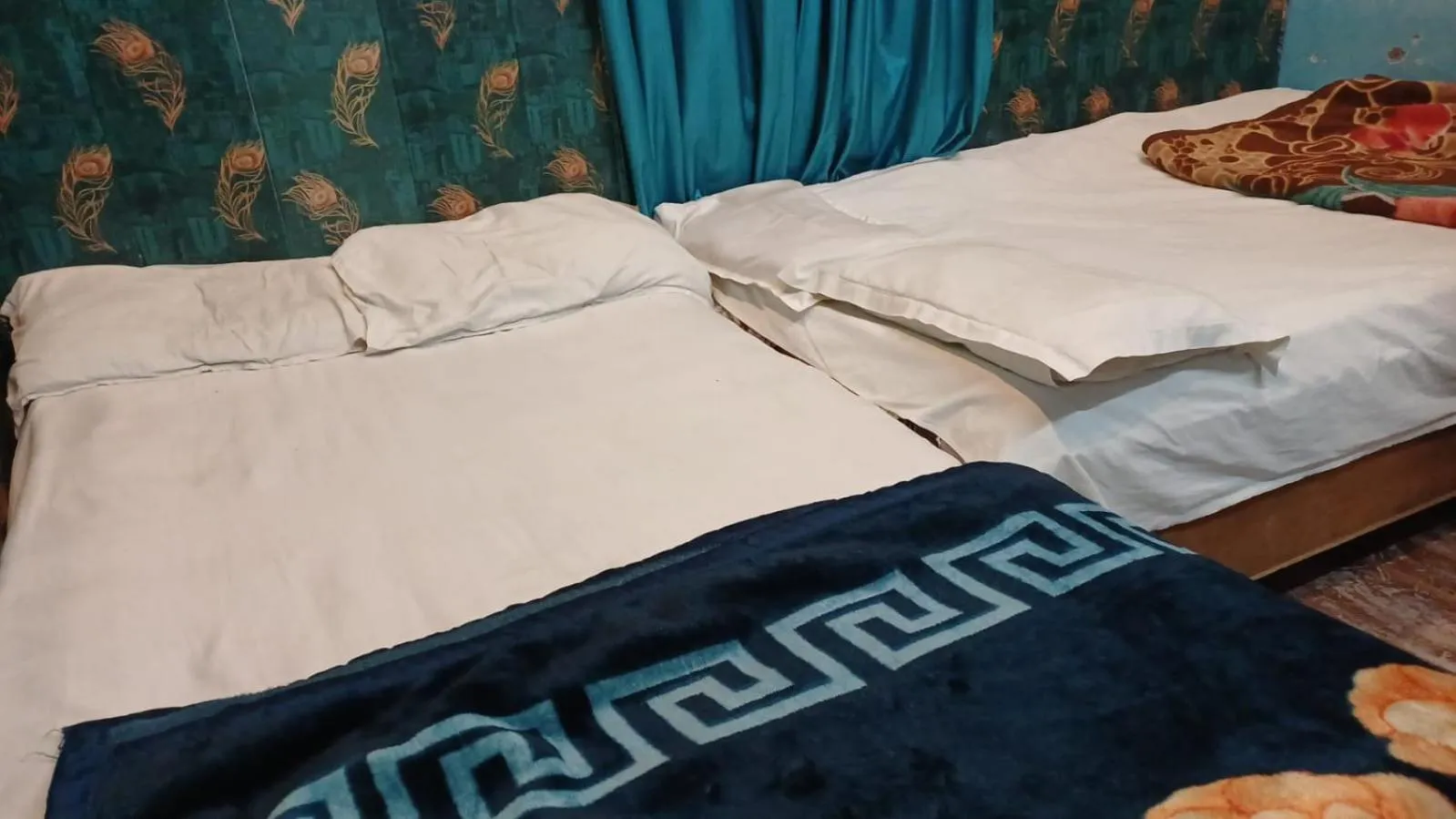 Bed in Maa Tara AC Home Stay