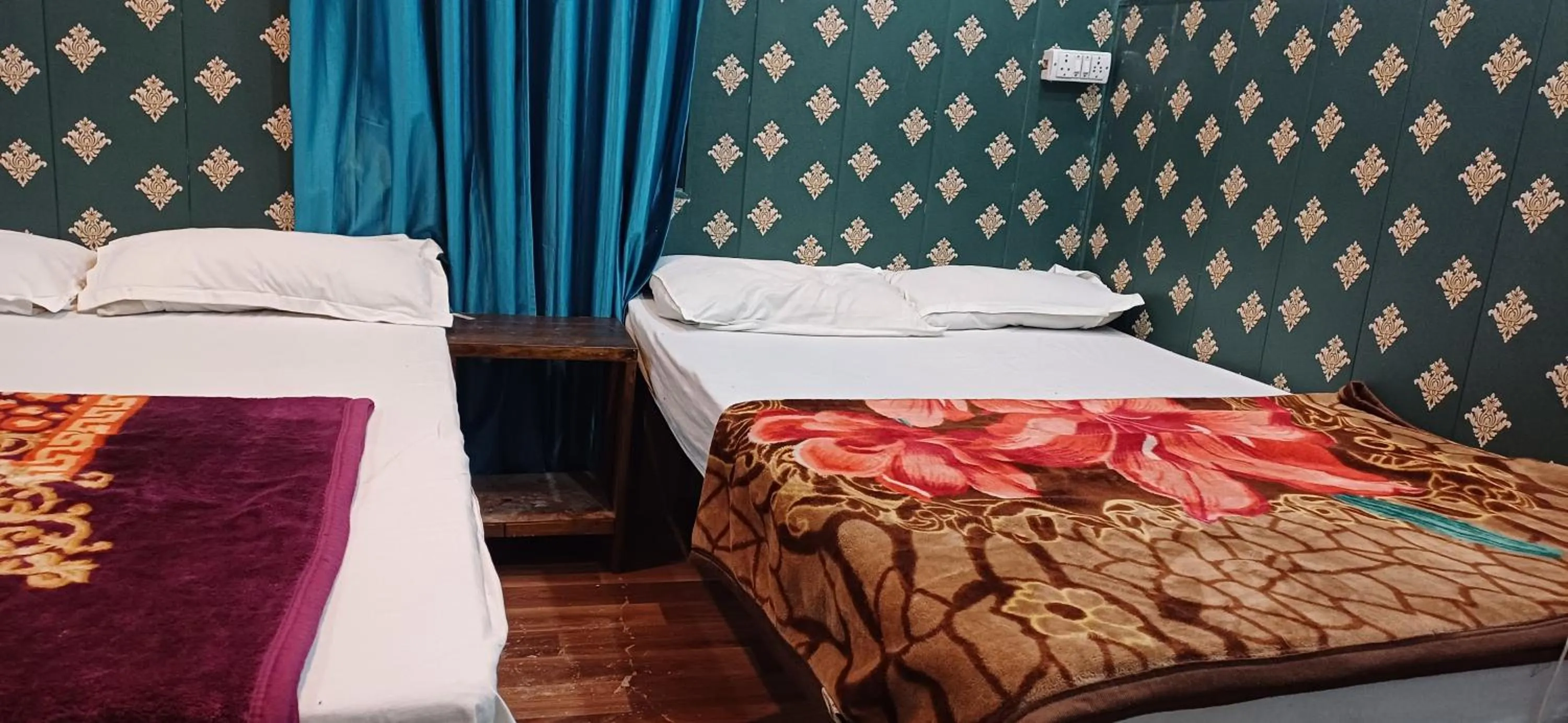 Bed in Maa Tara AC Home Stay