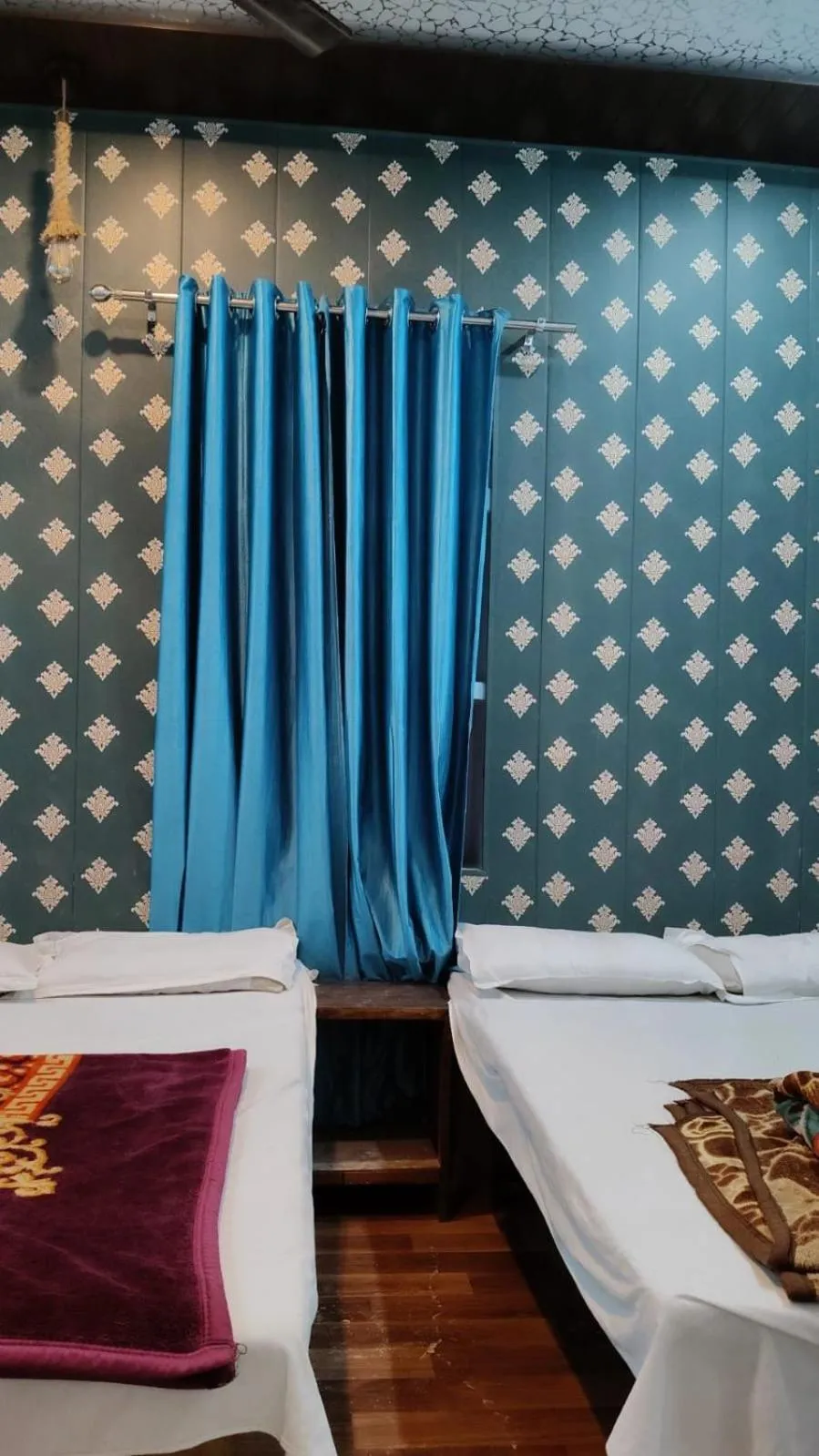 Bed in Maa Tara AC Home Stay