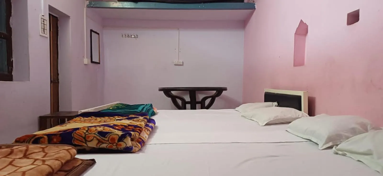 Bed in Maa Tara AC Home Stay