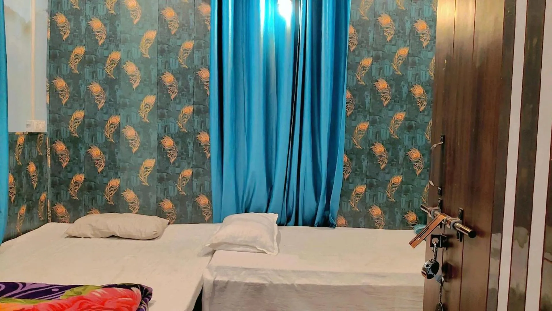 Bed in Maa Tara AC Home Stay