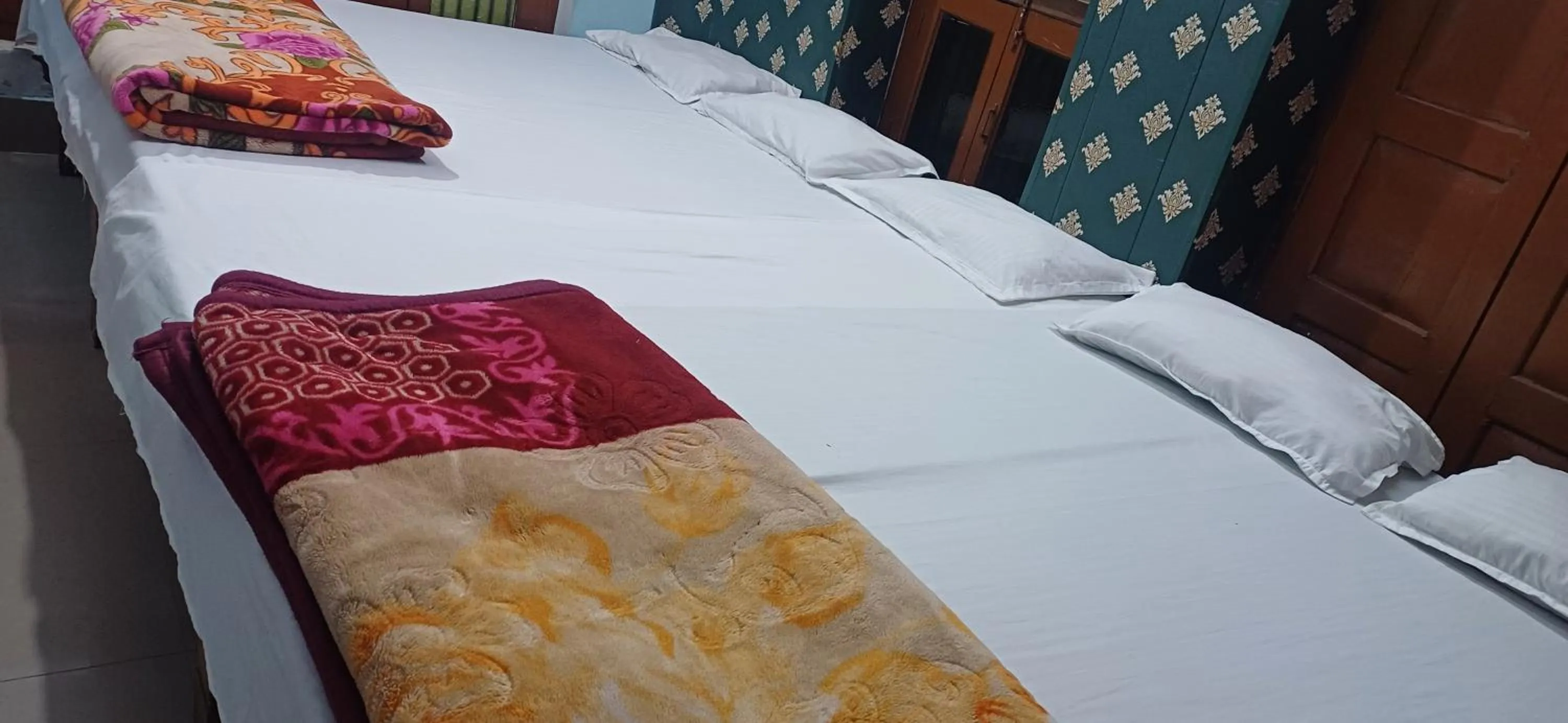 Bed in Maa Tara AC Home Stay