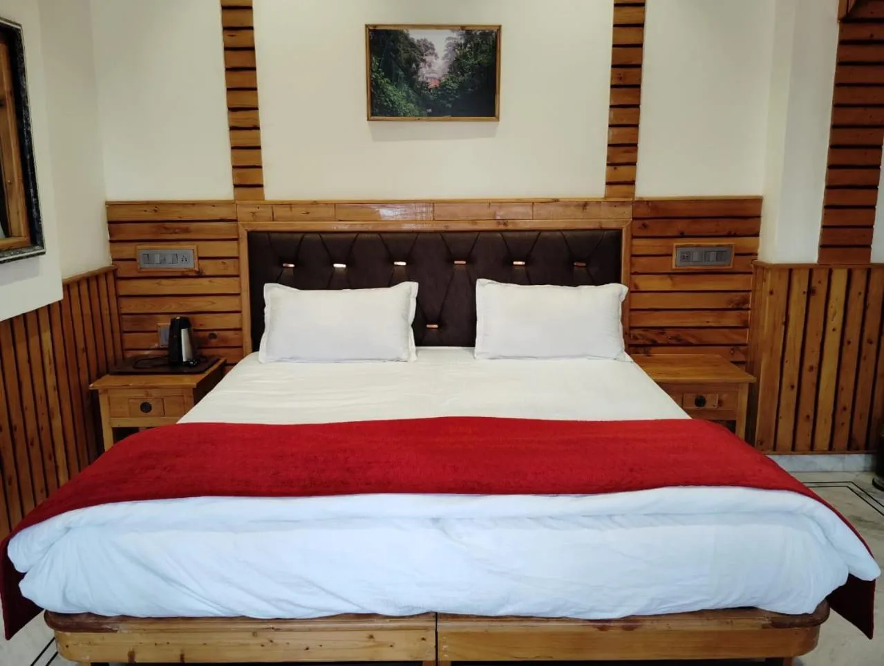 Bed in Hotel CM Palace - Pure Vegetarian