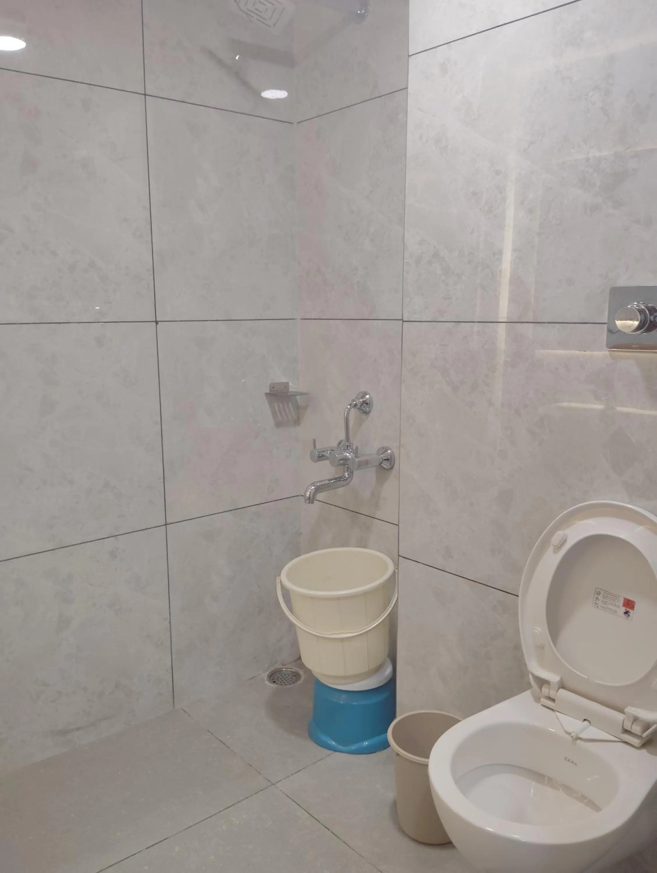 Toilet in Hotel CM Palace - Pure Vegetarian