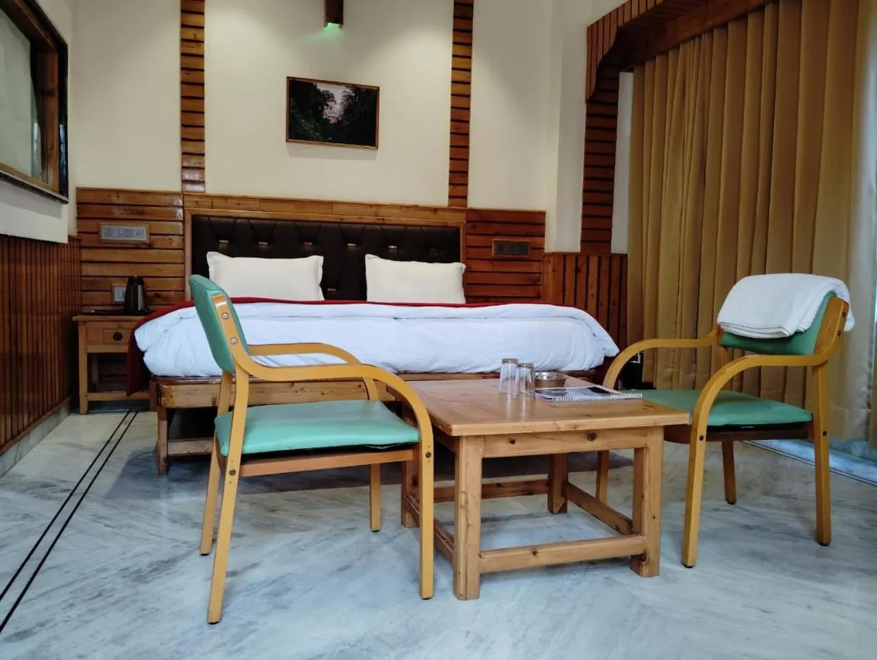 Dining area in Hotel CM Palace - Pure Vegetarian