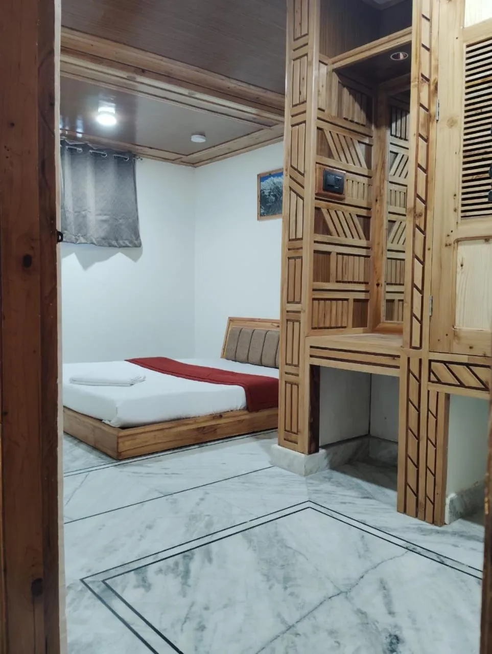 Bed in Hotel CM Palace - Pure Vegetarian