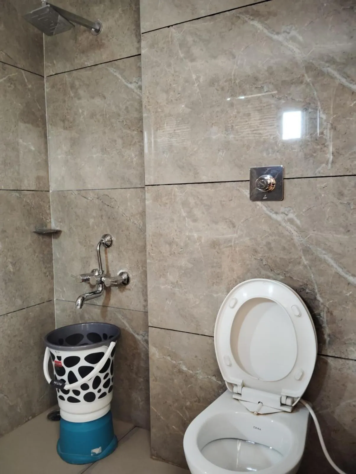 Bathroom in Hotel CM Palace - Pure Vegetarian