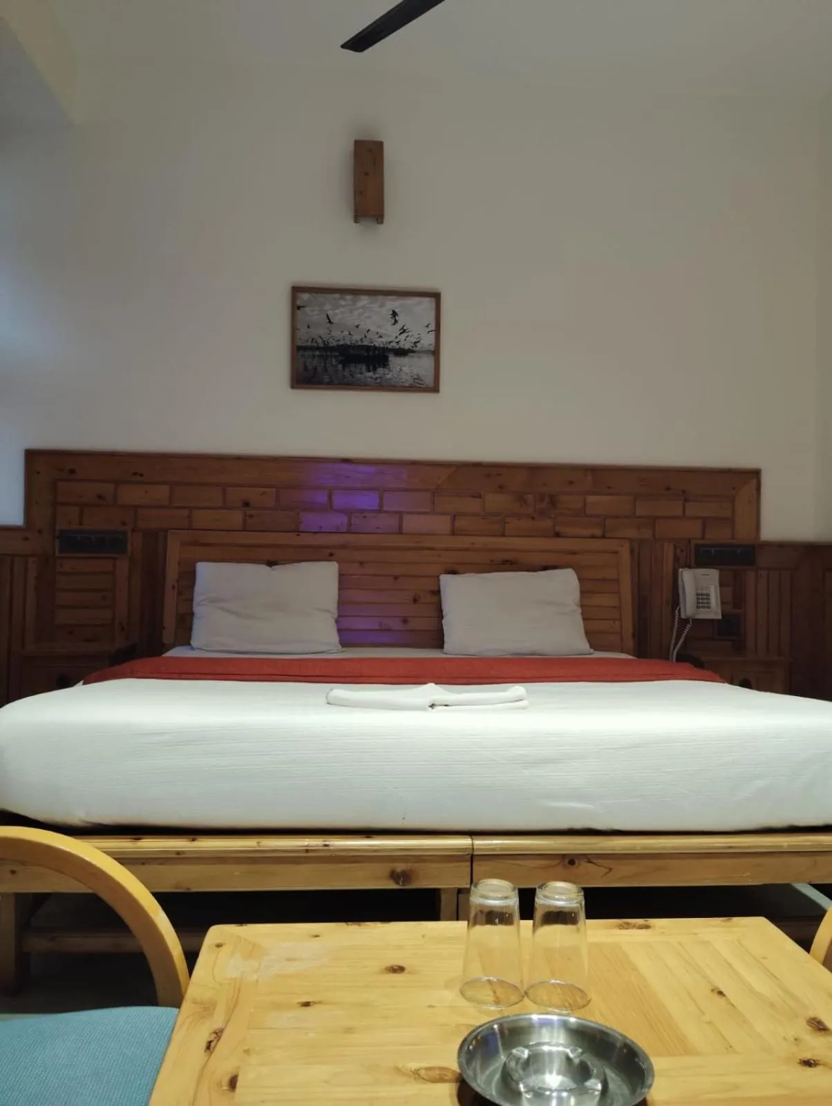 Bed in Hotel CM Palace - Pure Vegetarian