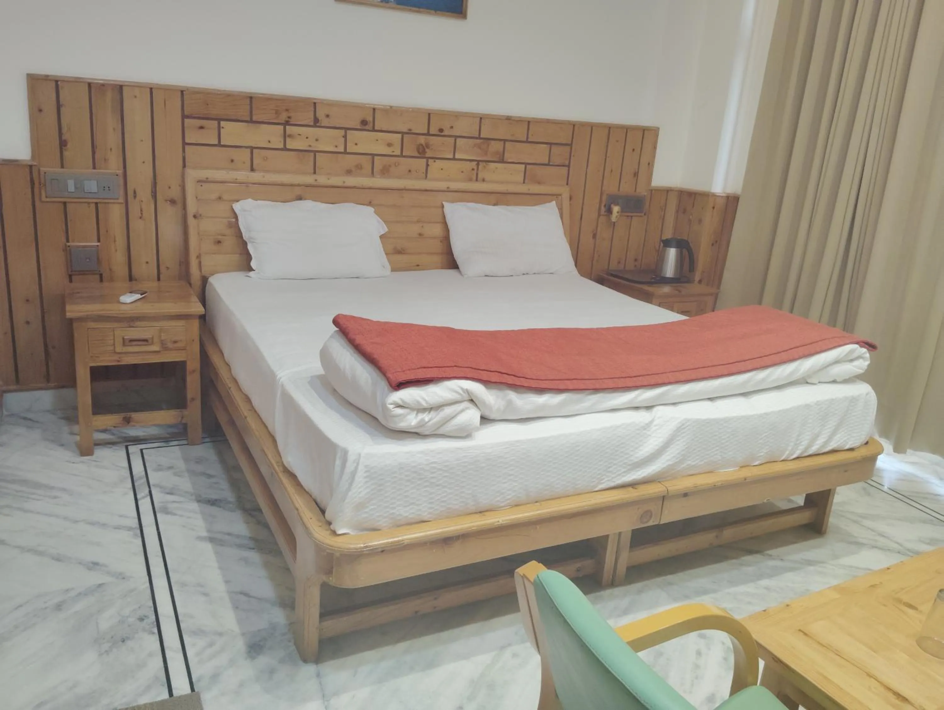 Bed in Hotel CM Palace - Pure Vegetarian